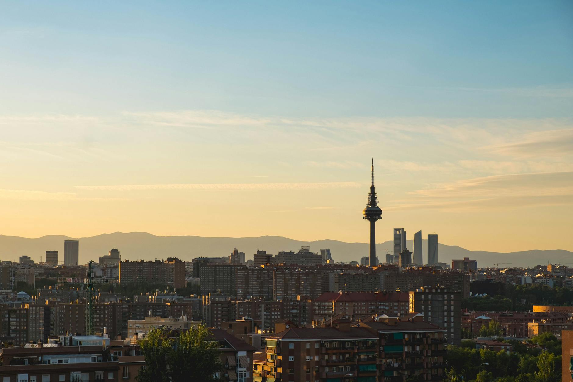 Madrid skyline at sunset with Torre Espana and modern towers