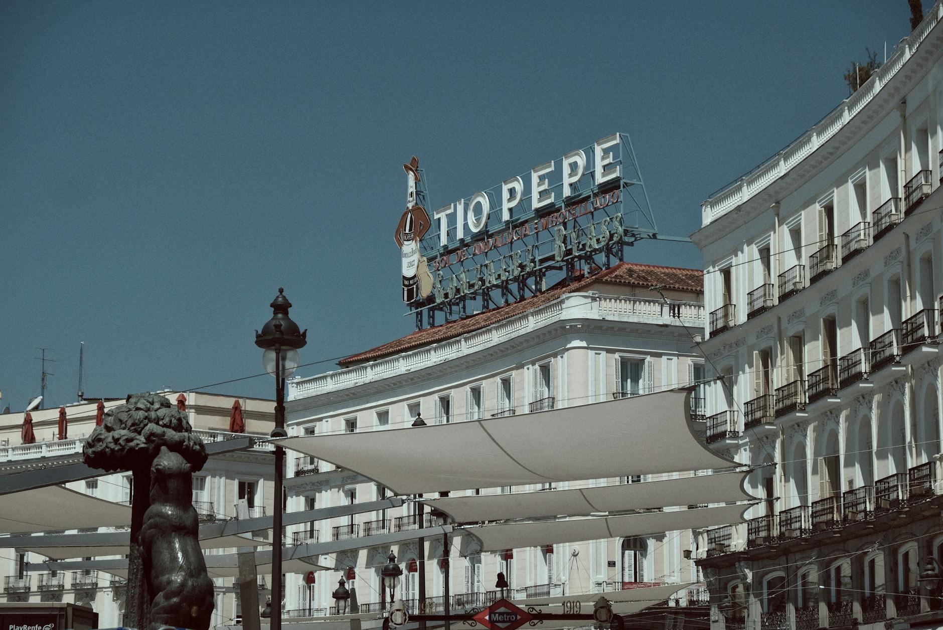 Puerta del Sol in central Madrid with the Tio Pepe sign