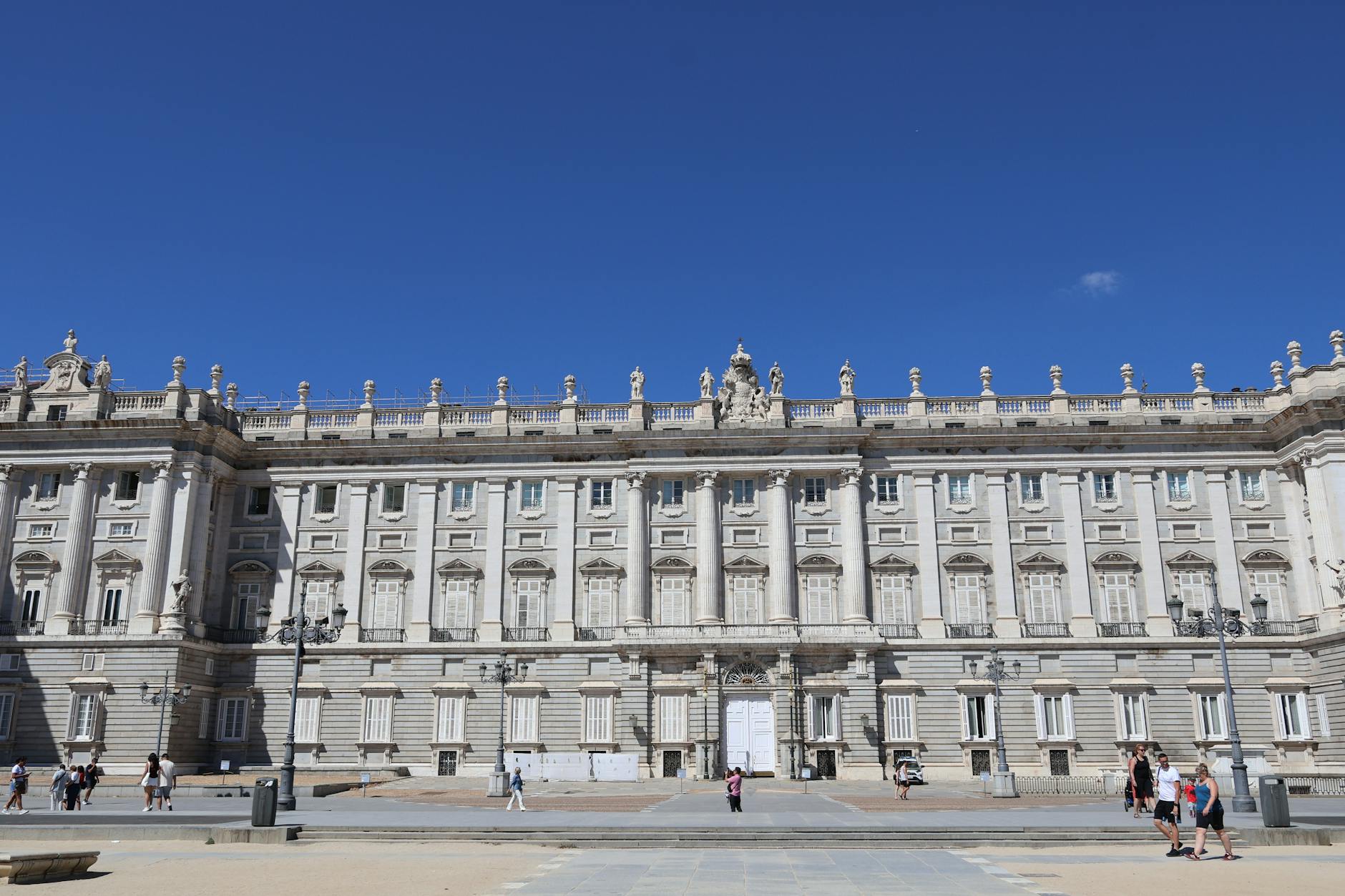 Royal Palace of Madrid under a clear blue sky