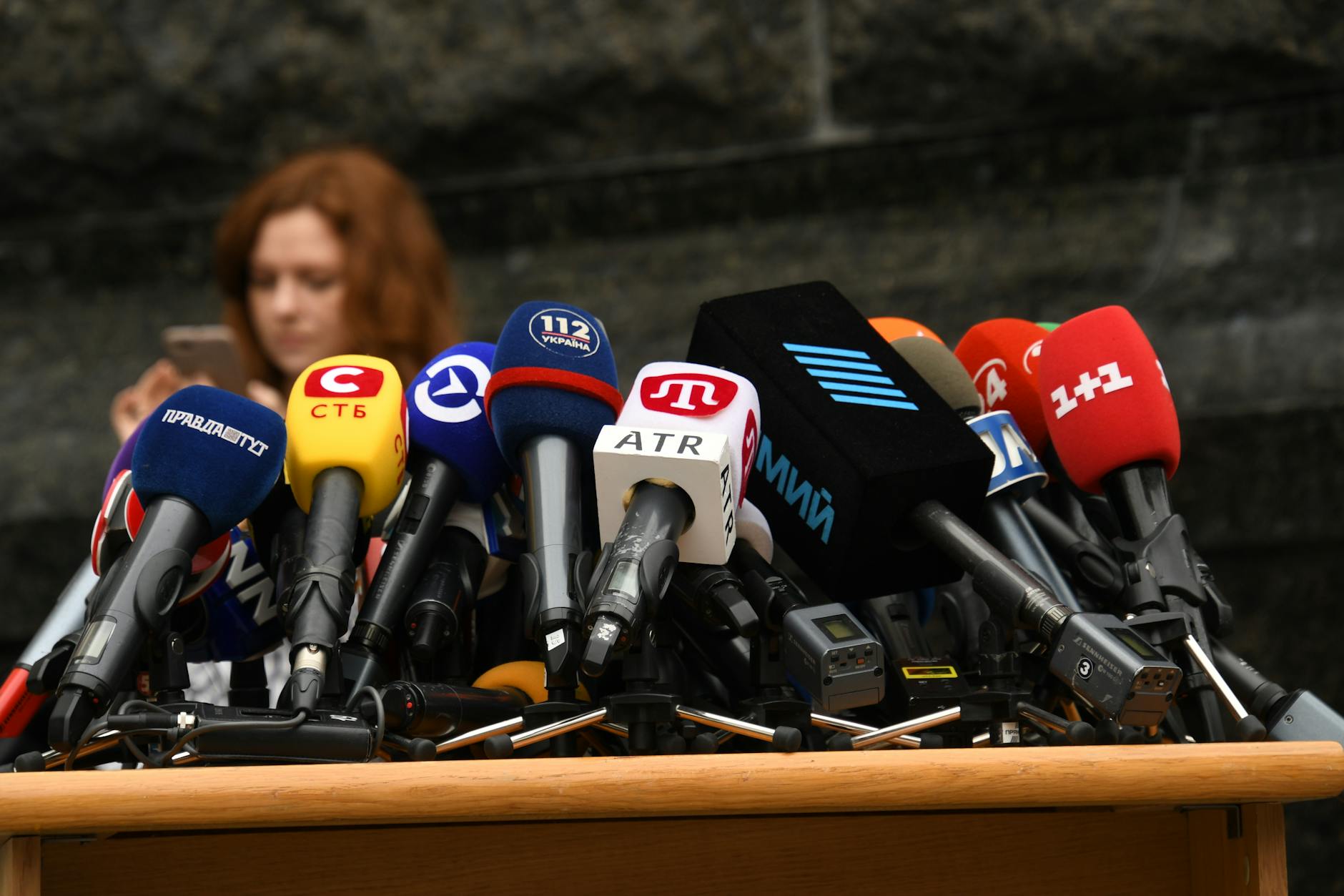 Microphones set up for a press conference