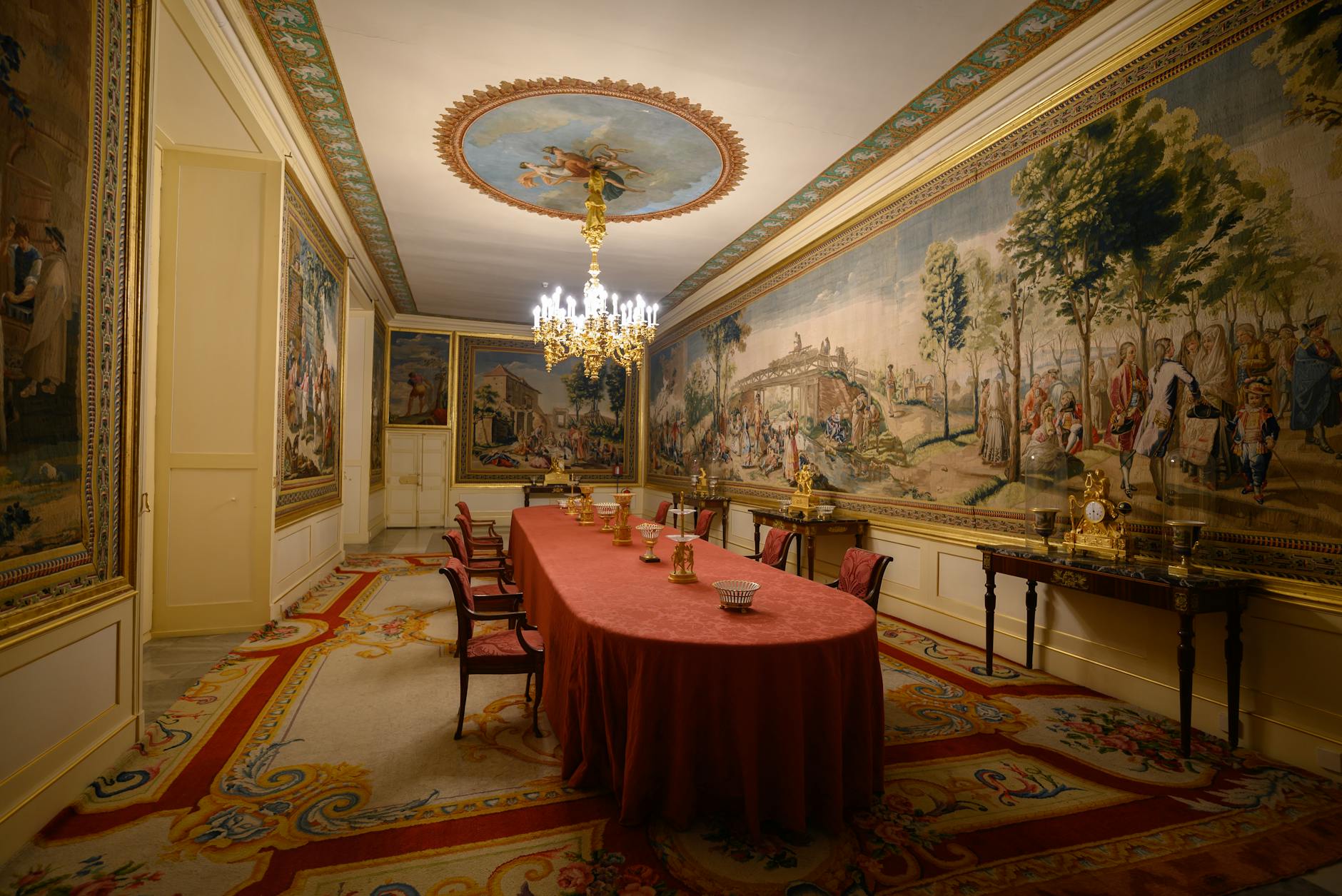 Elegant dining room in Madrid with tapestries and chandelier