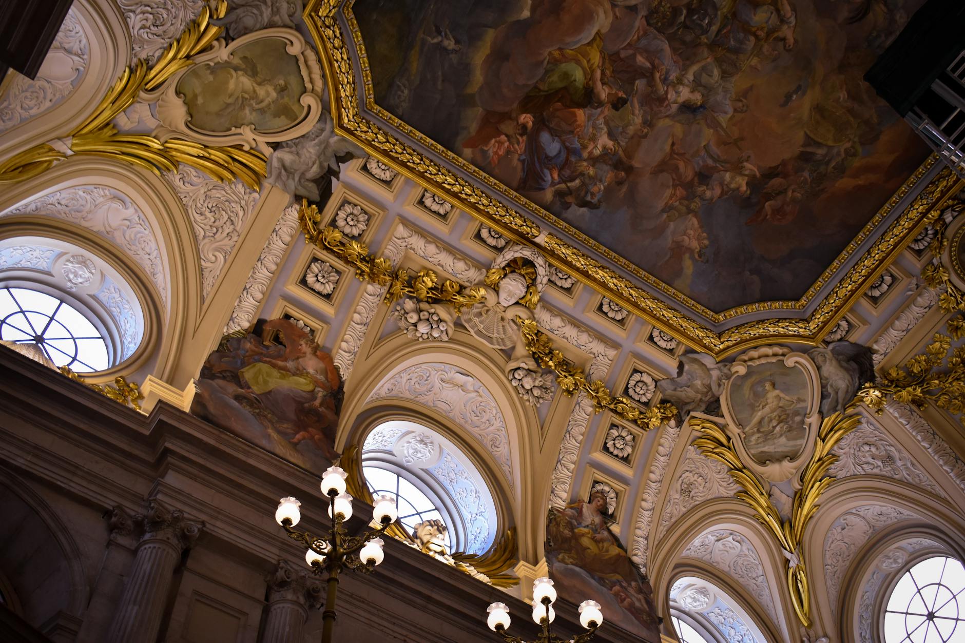 Baroque ceiling artwork inside the Royal Palace of Madrid