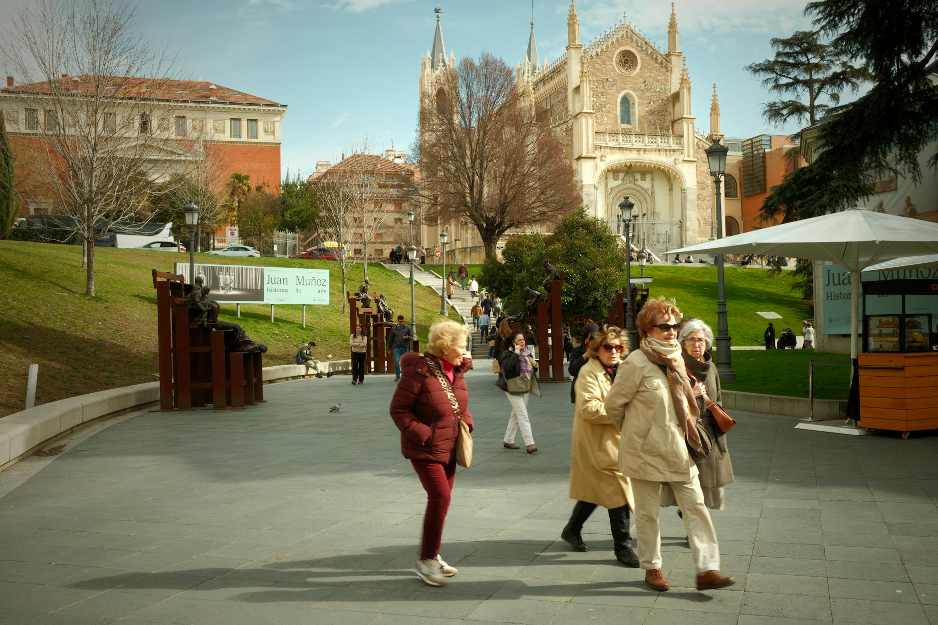 People walking near San Jeronimo el Real Church in Madrid