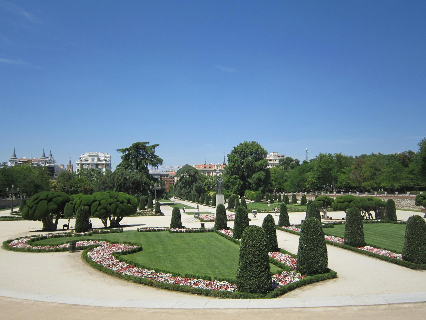 Manicured gardens and trees in Buen Retiro Park