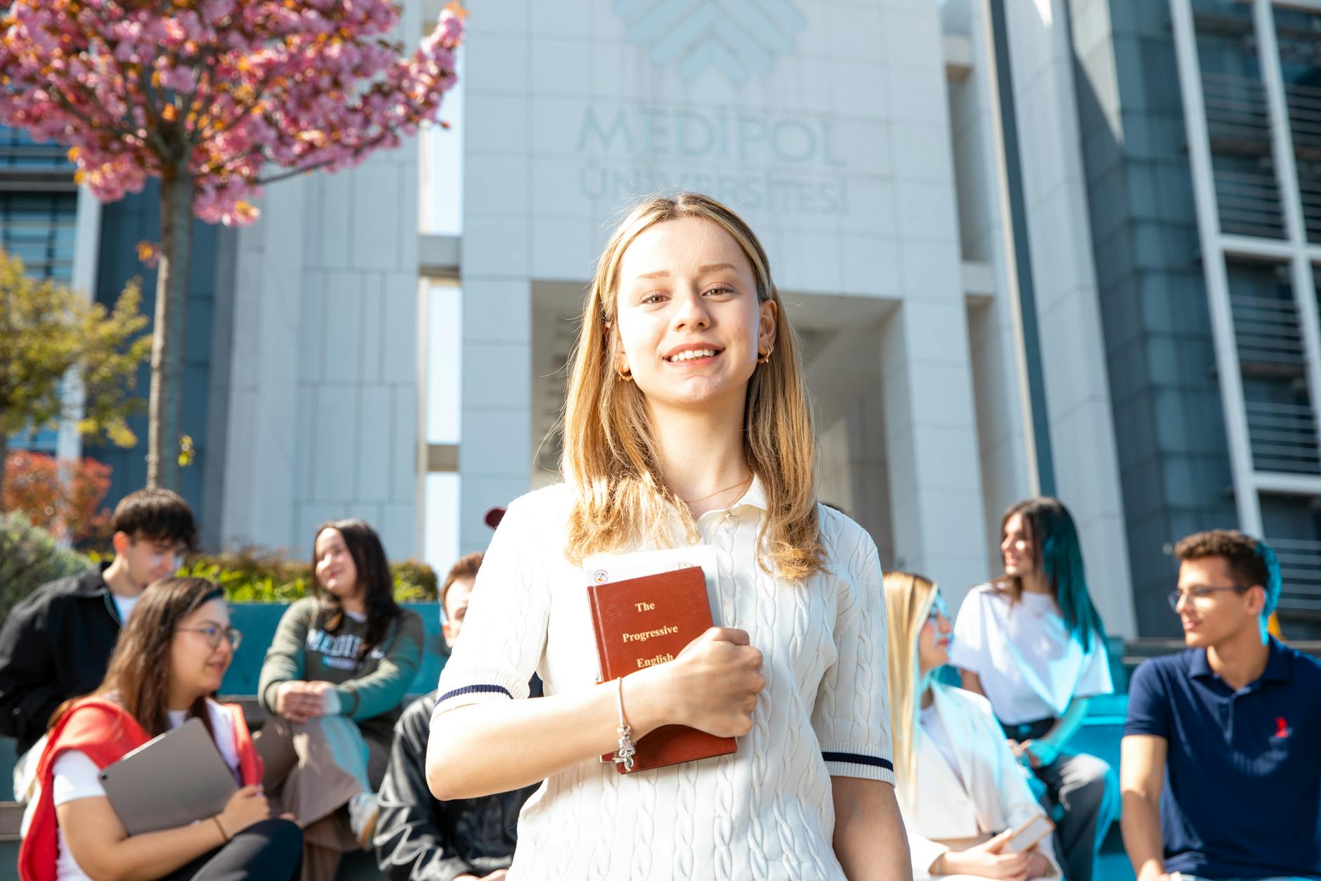 University students socializing outdoors on a campus