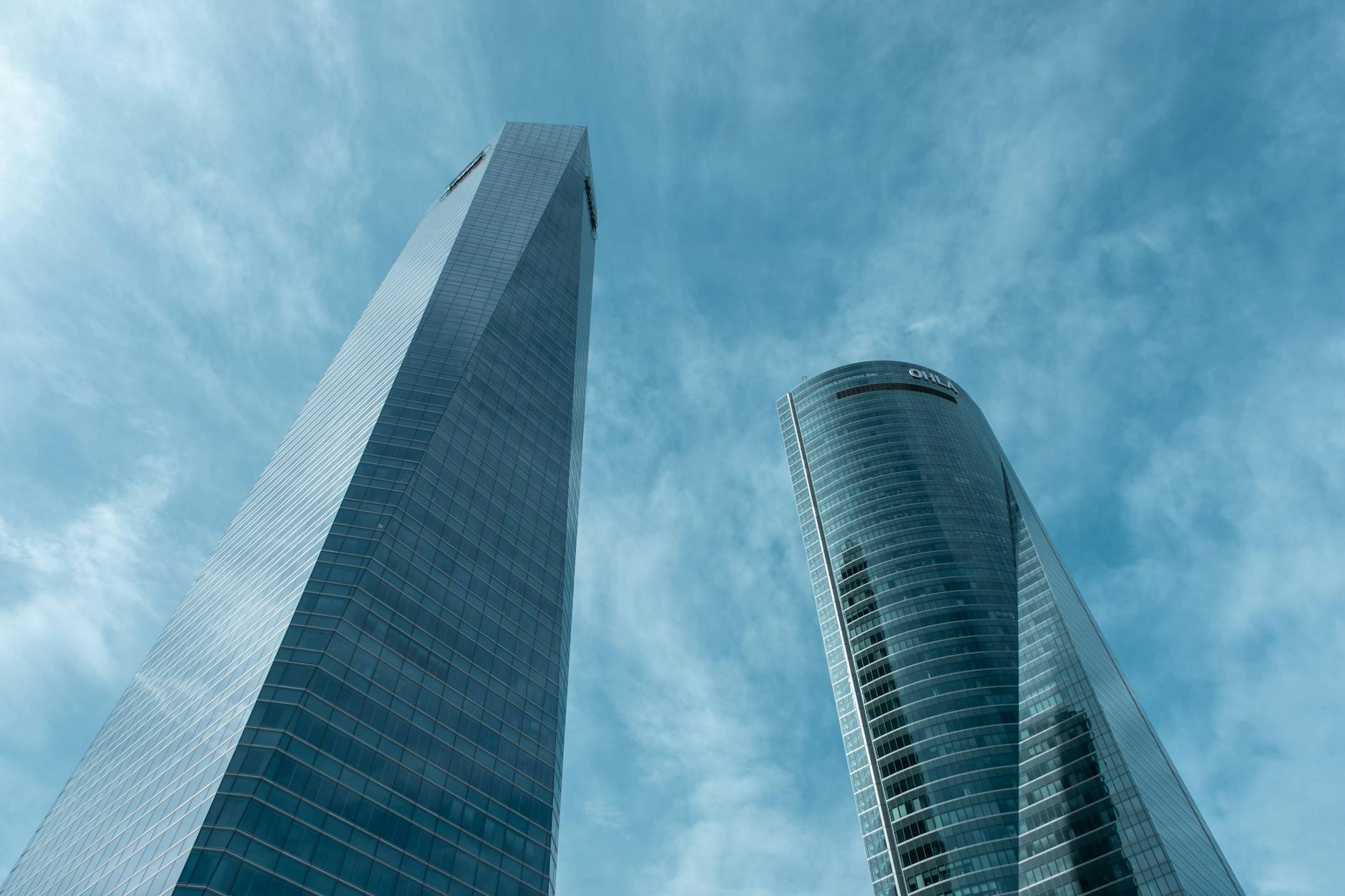 Modern Madrid skyscrapers against a clear blue sky