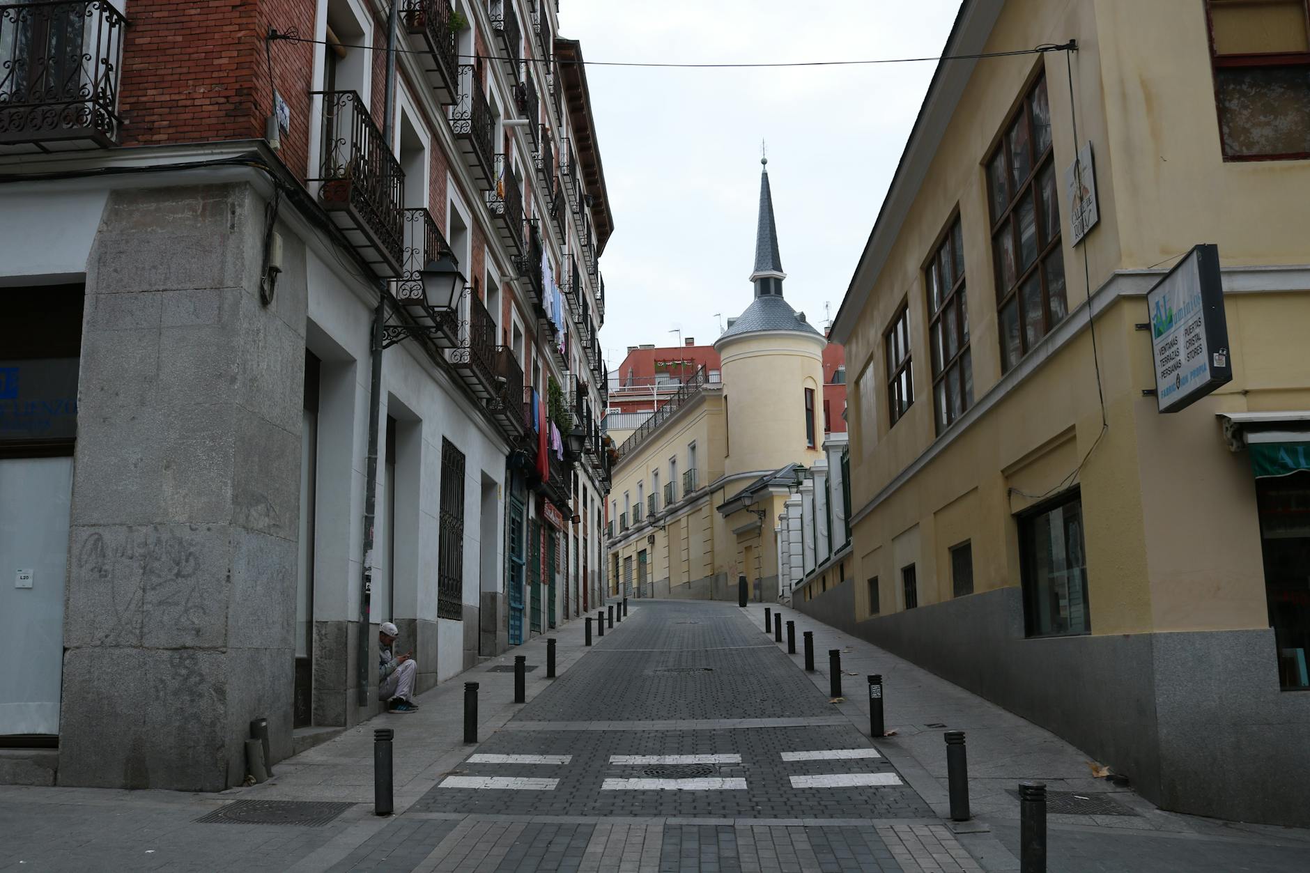 Historic Madrid street with colorful traditional buildings
