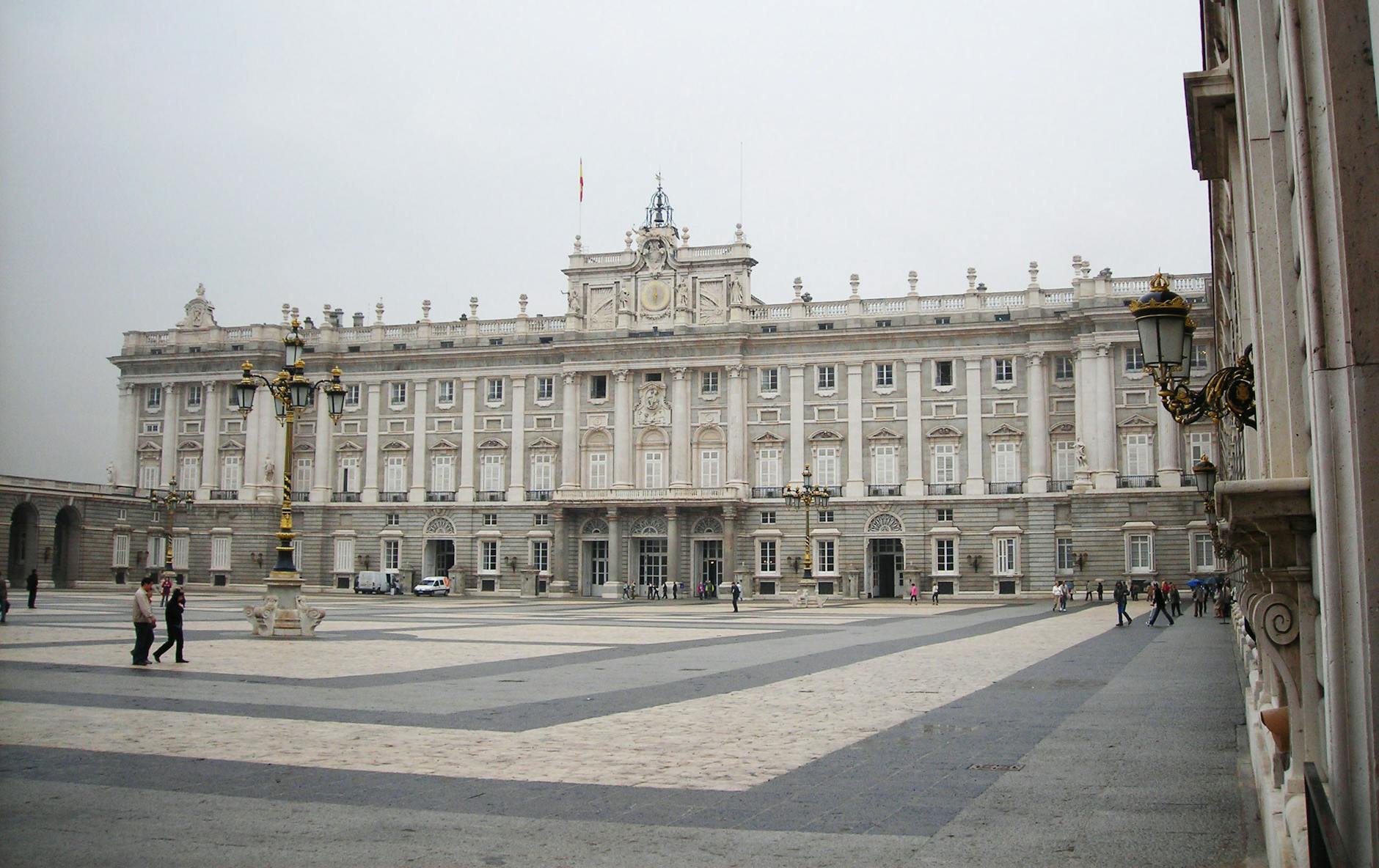 Royal Palace facade in a broad Madrid historical plaza