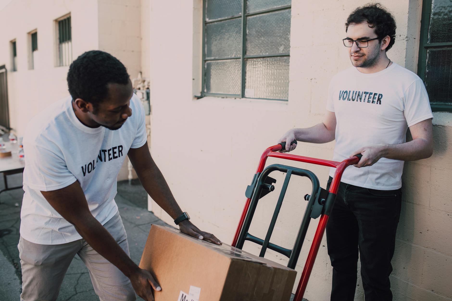 Volunteers loading aid boxes for distribution