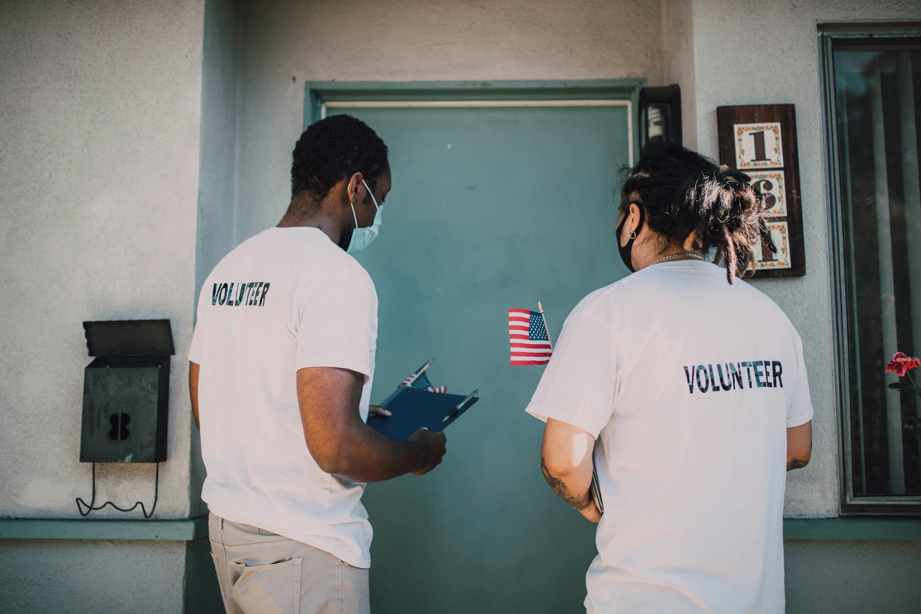 Volunteers making a community home visit