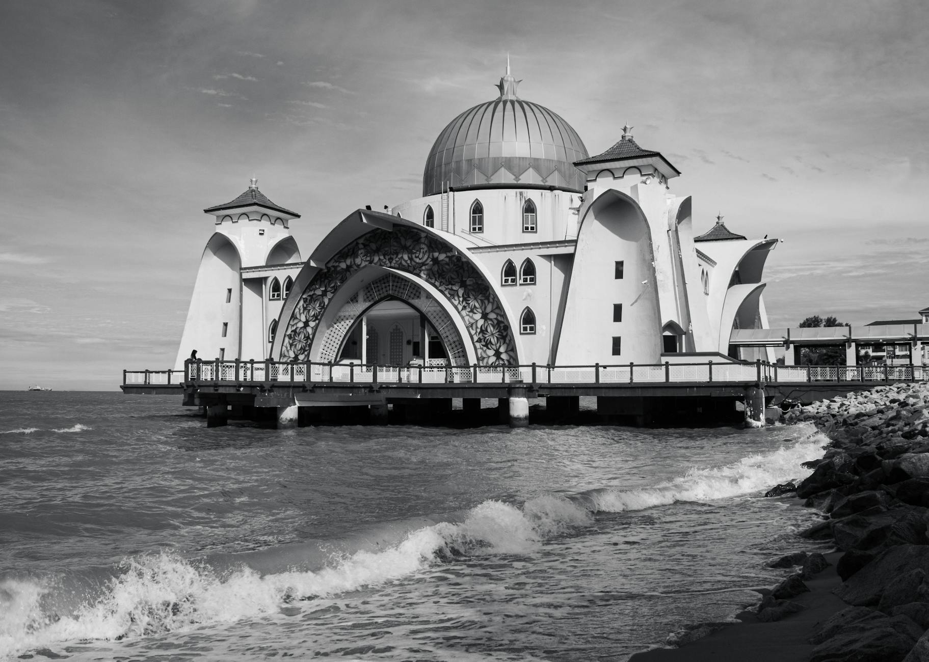 Malacca City riverfront and heritage pacing context.