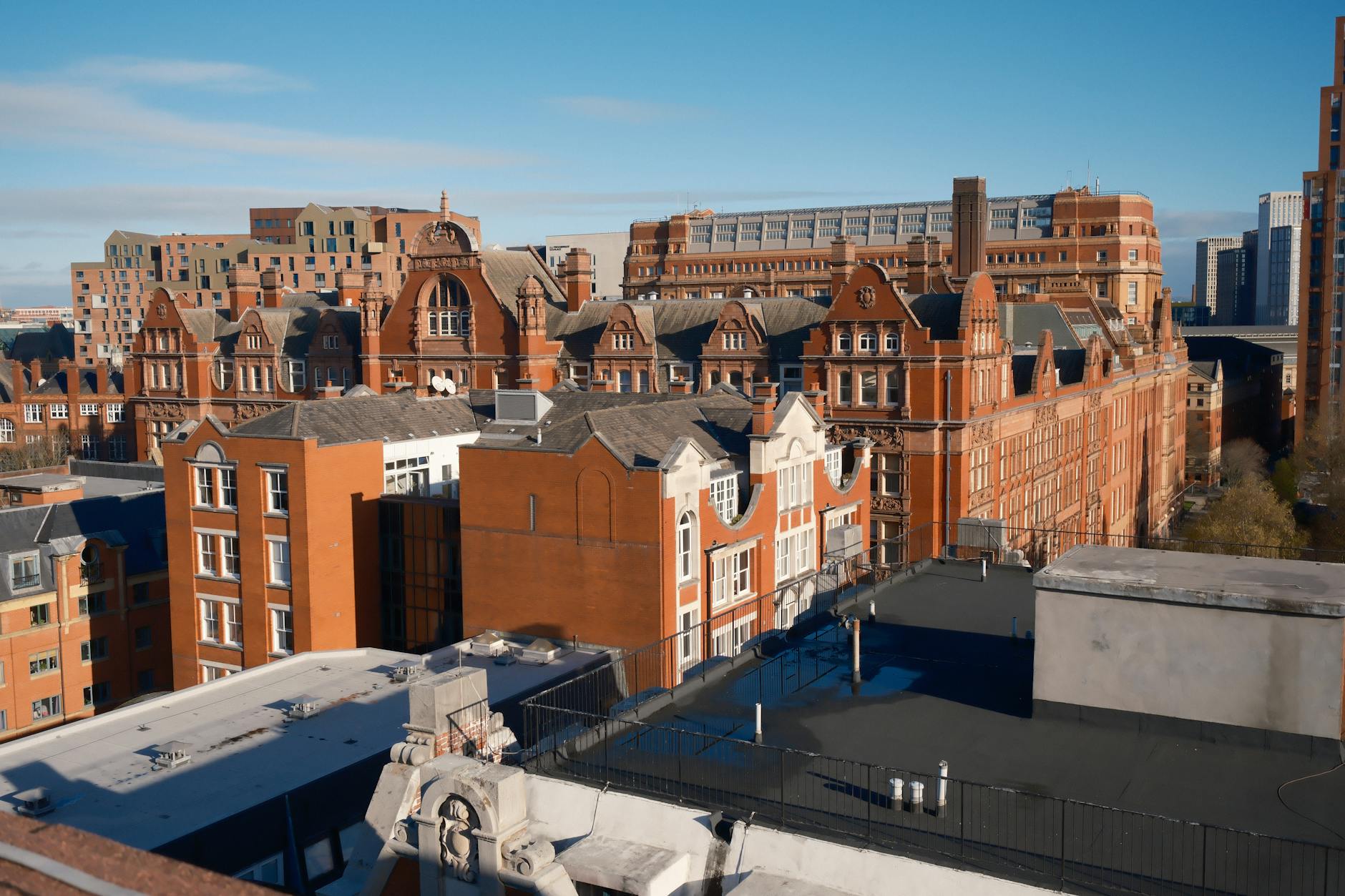 Aerial view of Manchester red brick buildings for client-geography planning