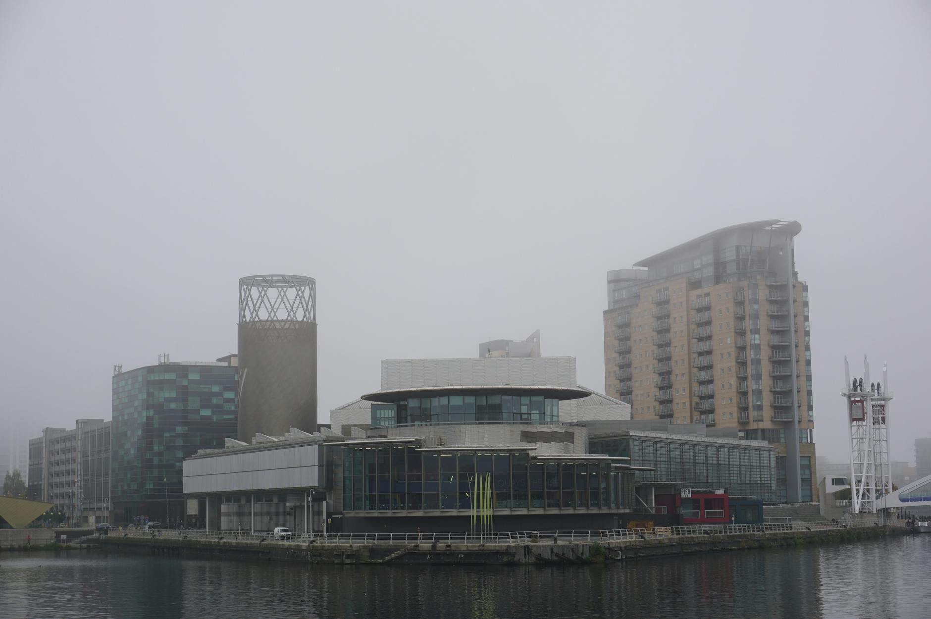 Misty morning view of modern Salford architecture
