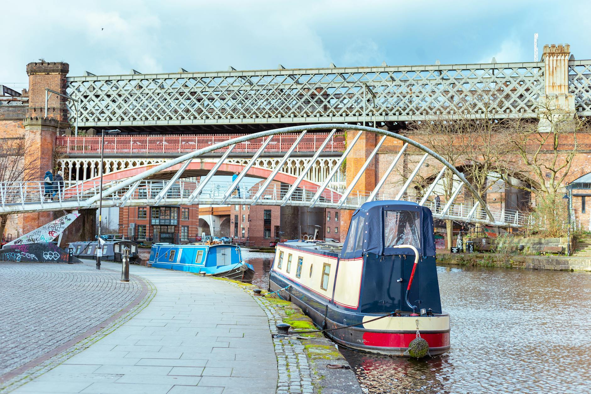 Canal boats and historic bridges in Manchester