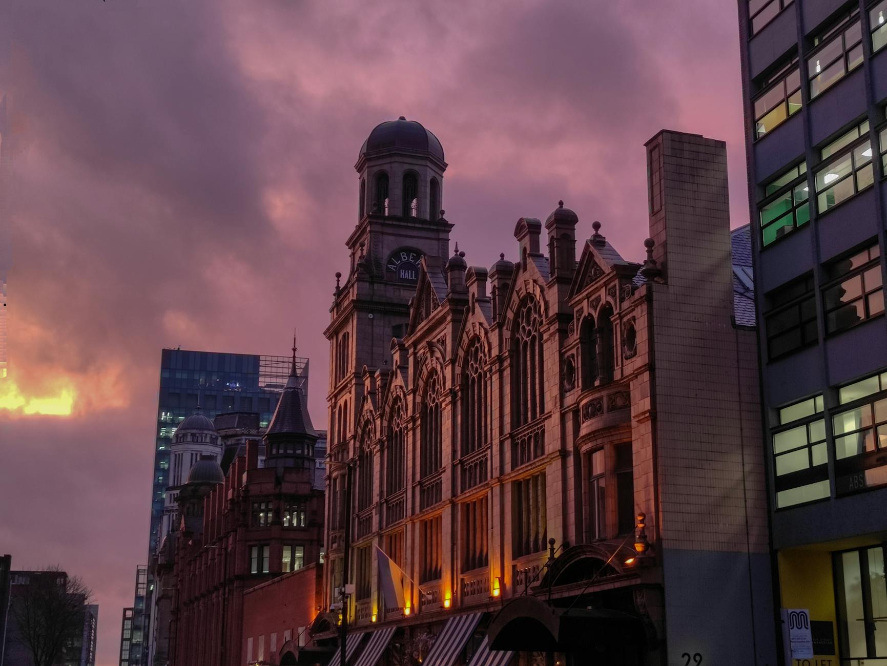 Albert Hall in Manchester at sunset with dramatic sky