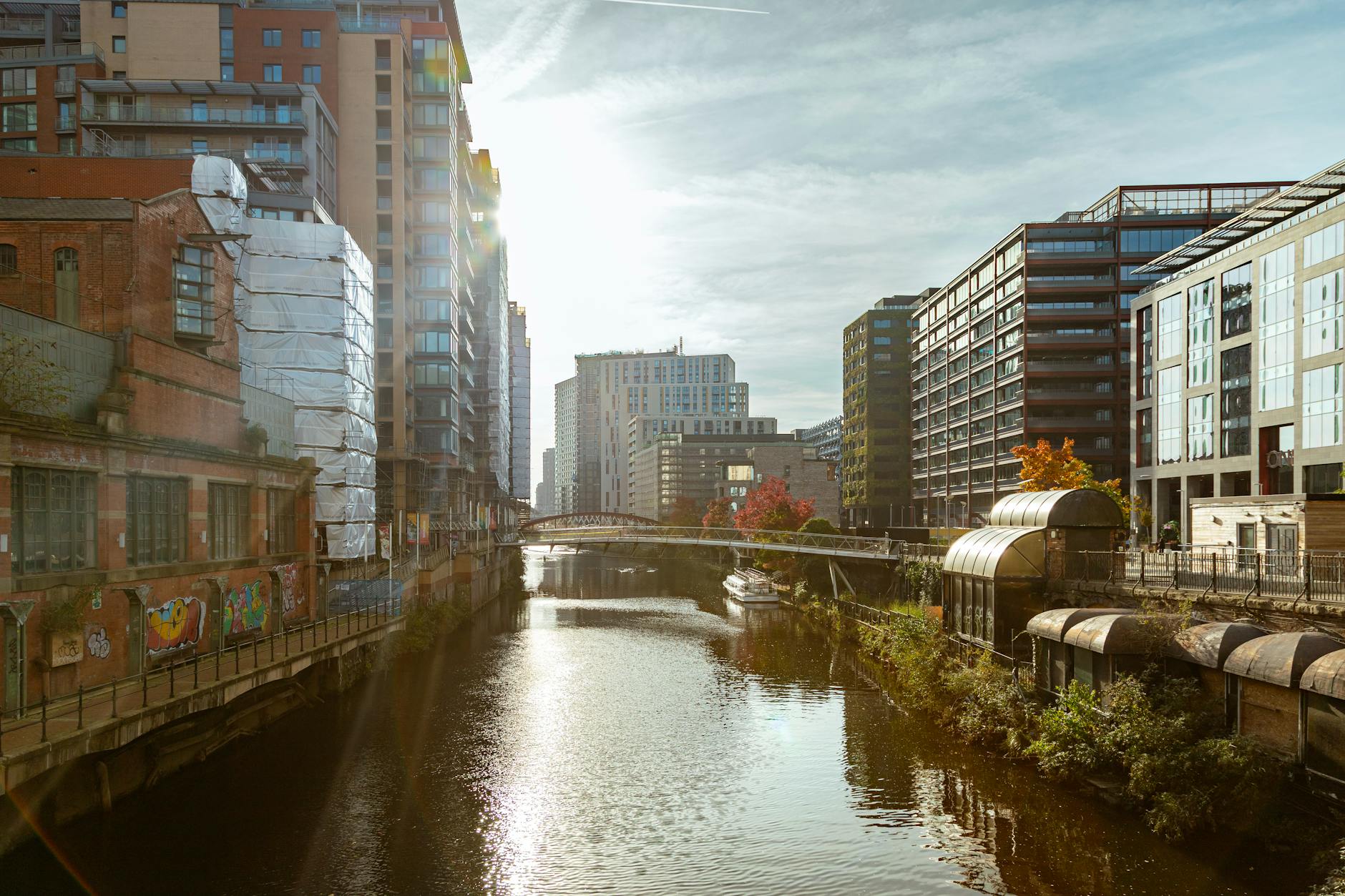 Manchester canal scene with modern and historic city buildings