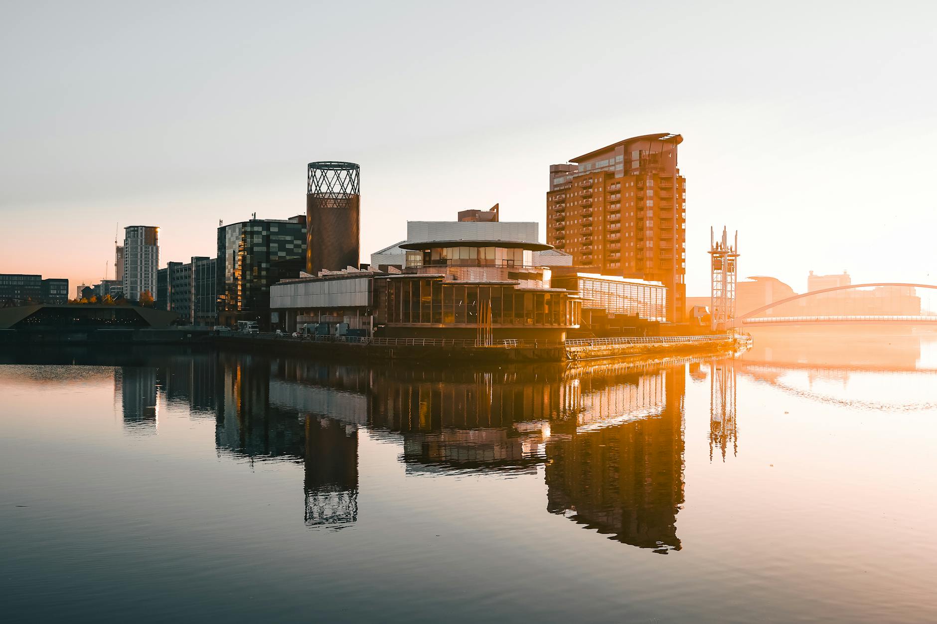 Sunset reflections at Salford Quays with modern Manchester architecture