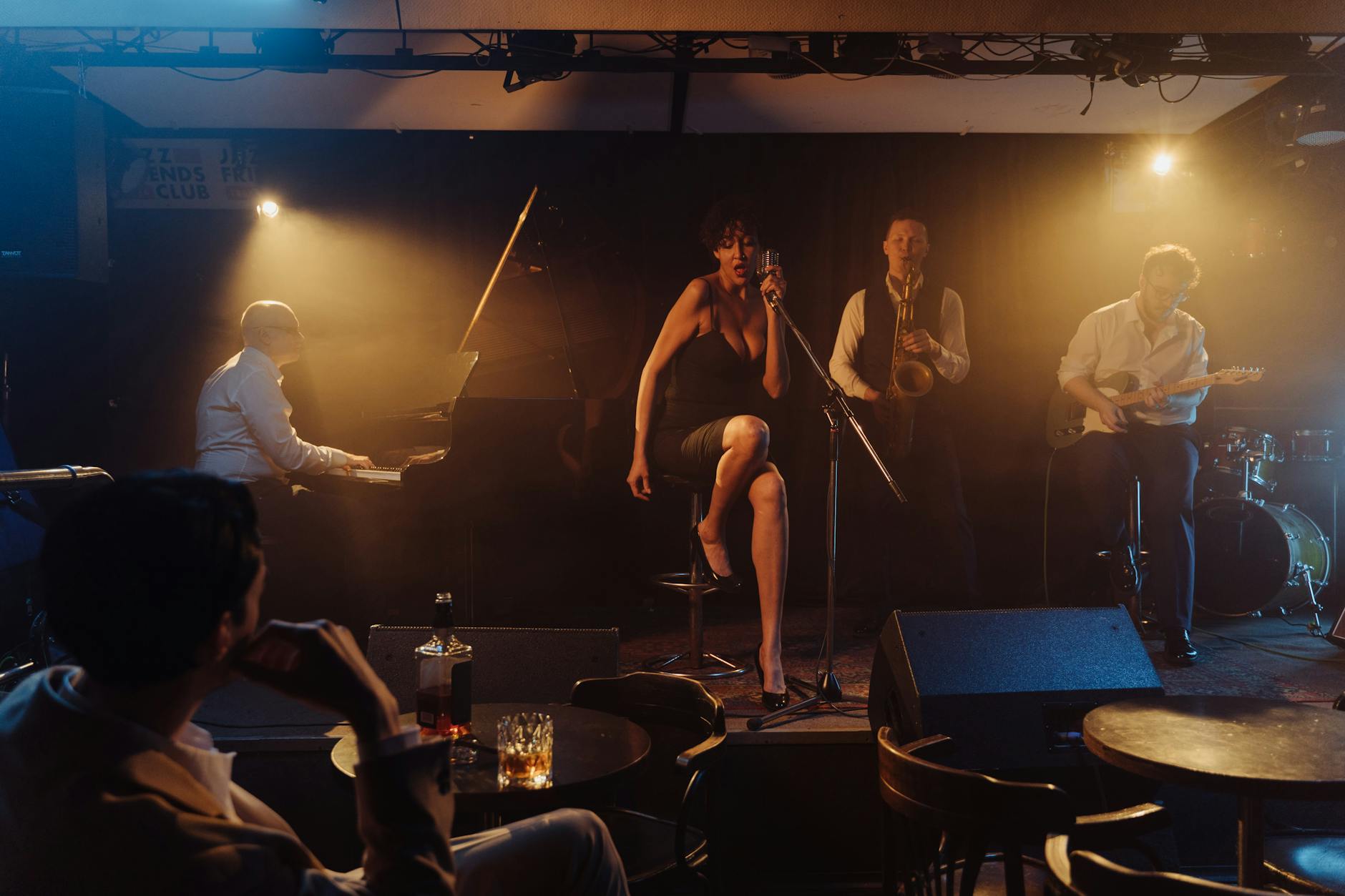 Live jazz band performing in a dimly lit nightclub
