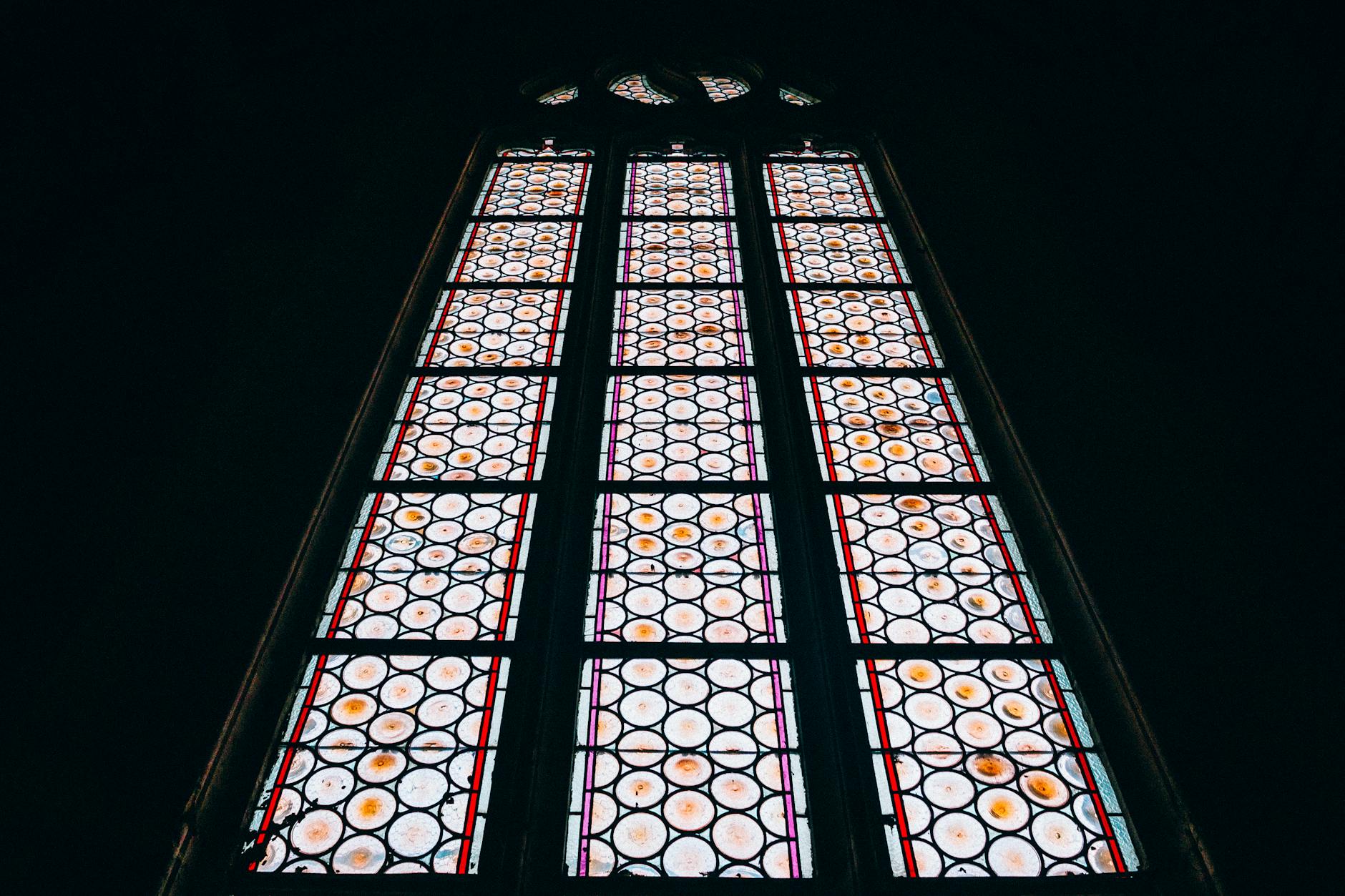 Detailed stained glass window in a sacred space