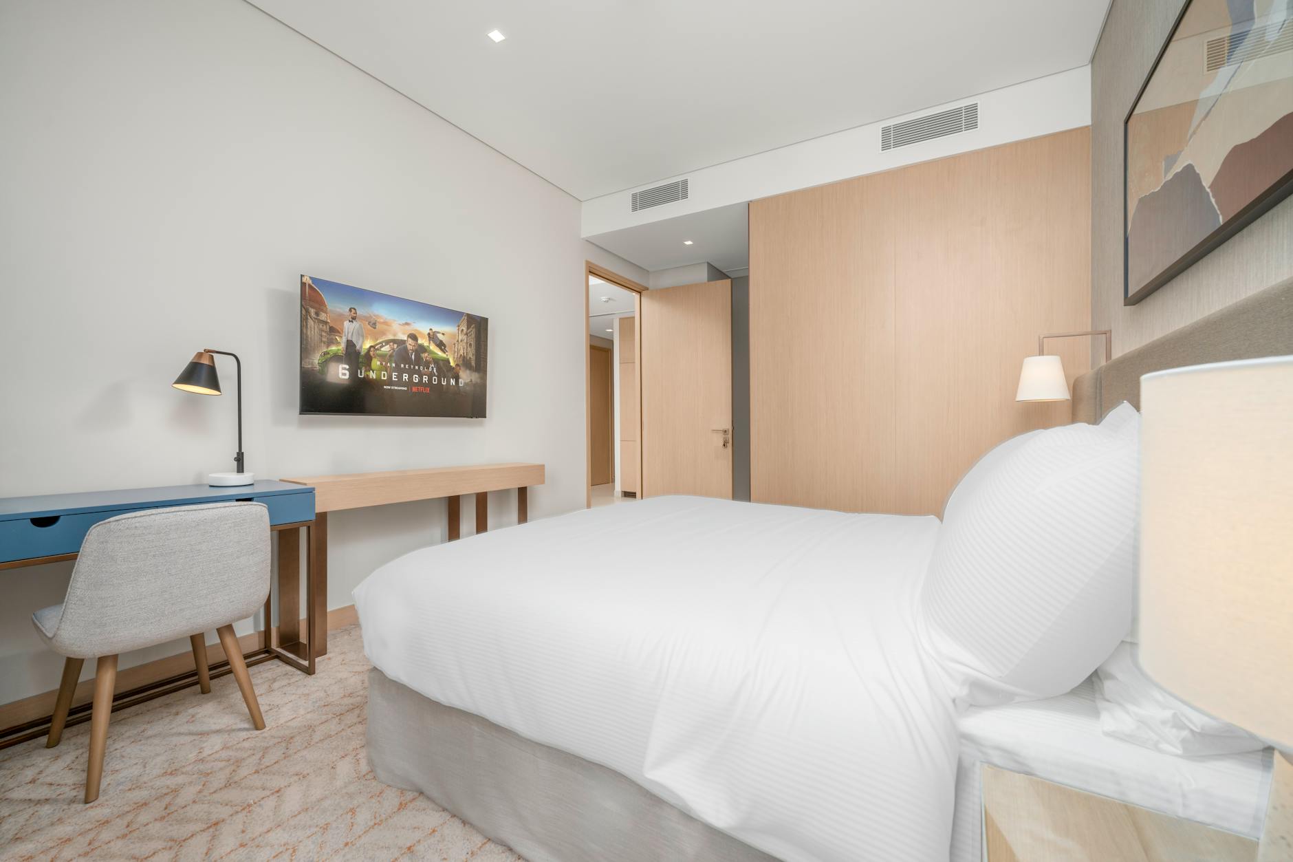 Modern hotel room with desk for sales follow-up work