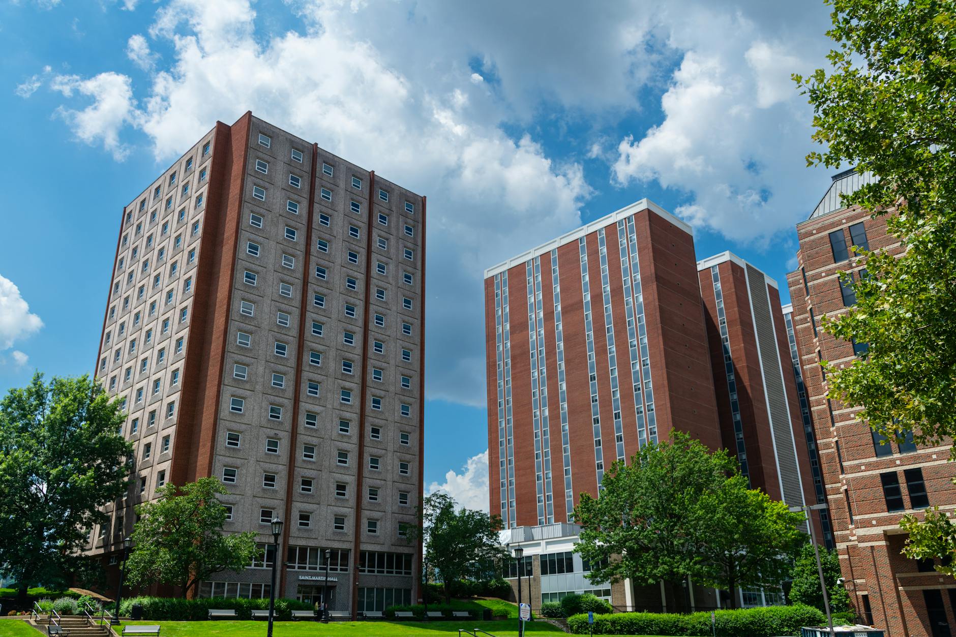 Tall brick residential buildings on a college campus