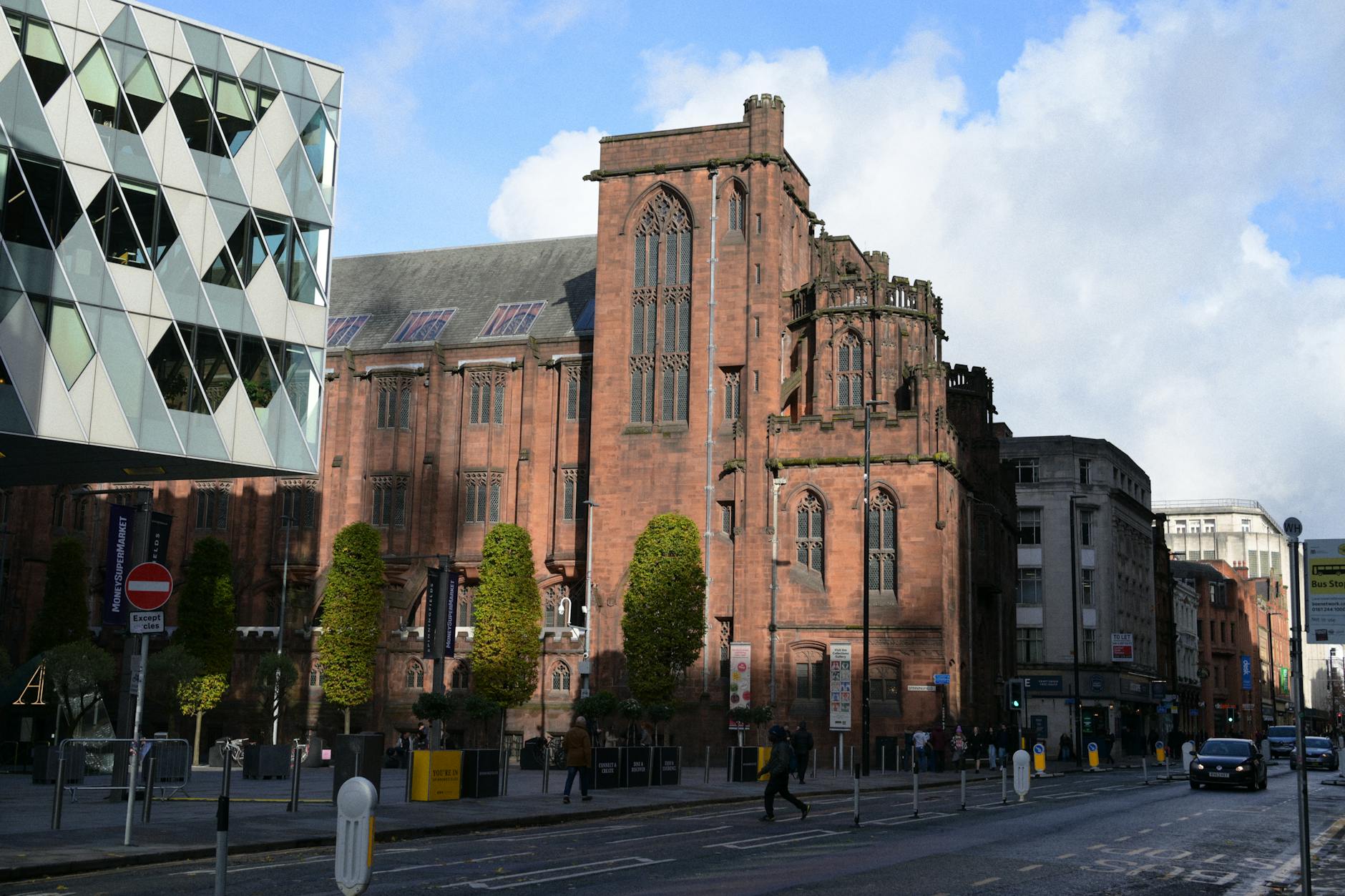 Manchester street with Gothic and modern architecture in contrast