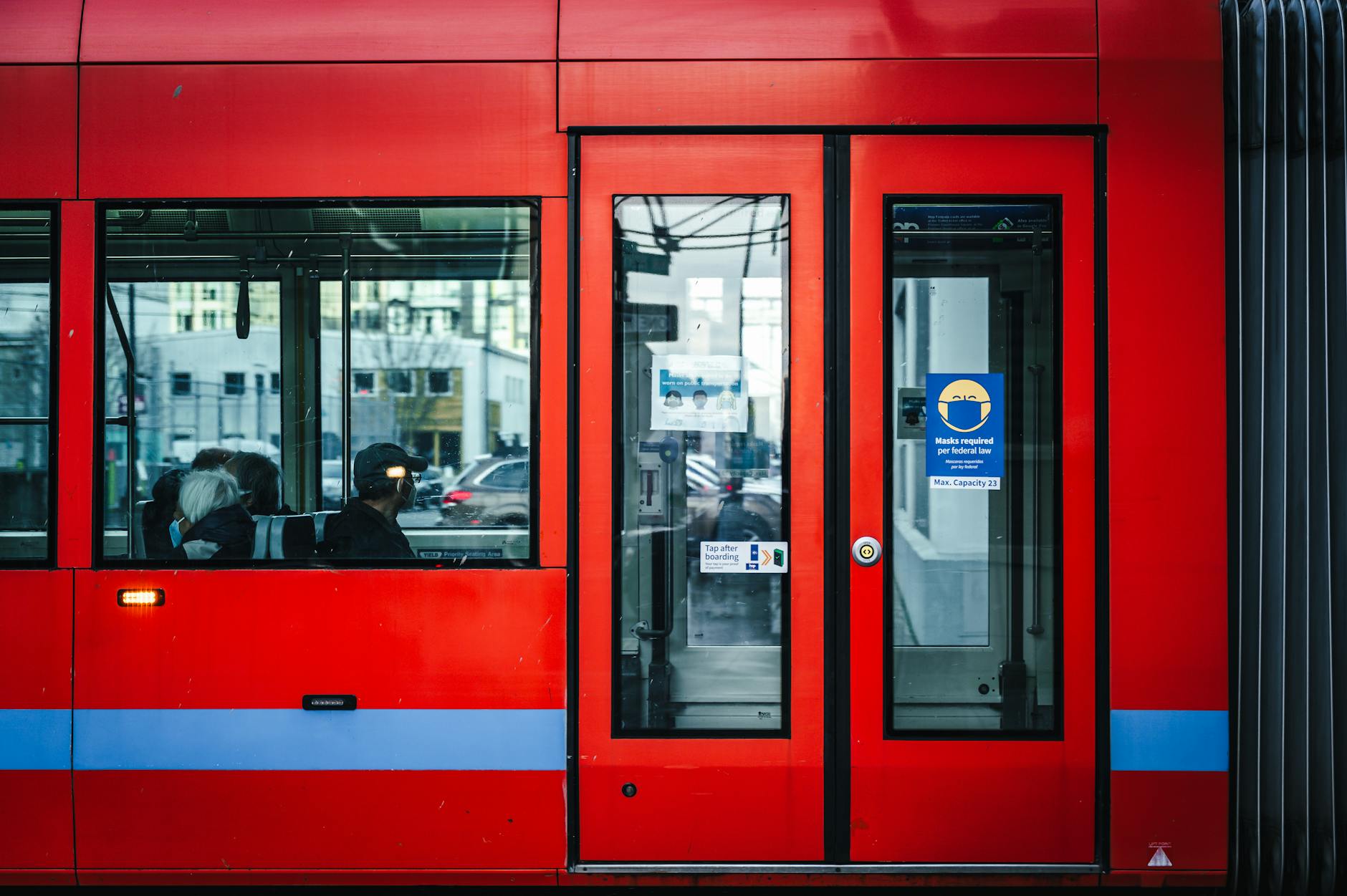 Commuters riding a tram for city transport planning