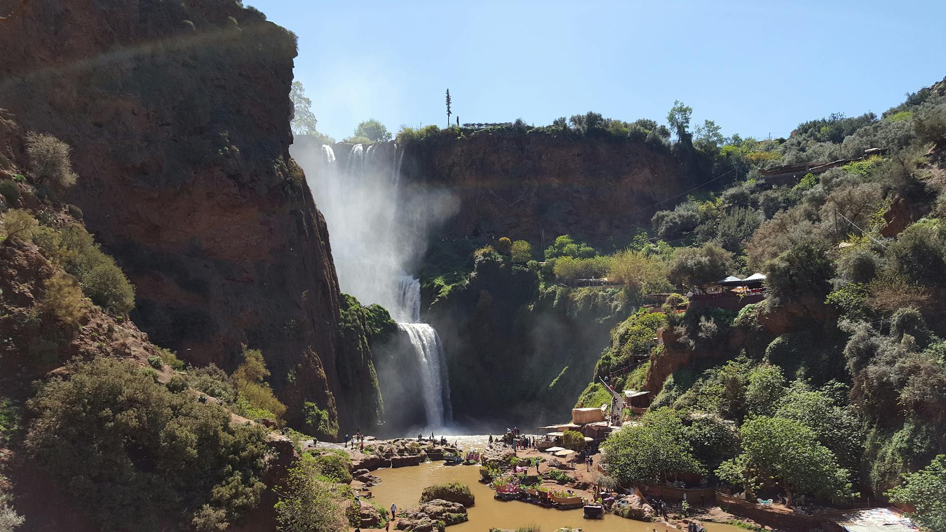 Ouzoud Waterfalls surrounded by greenery in Morocco