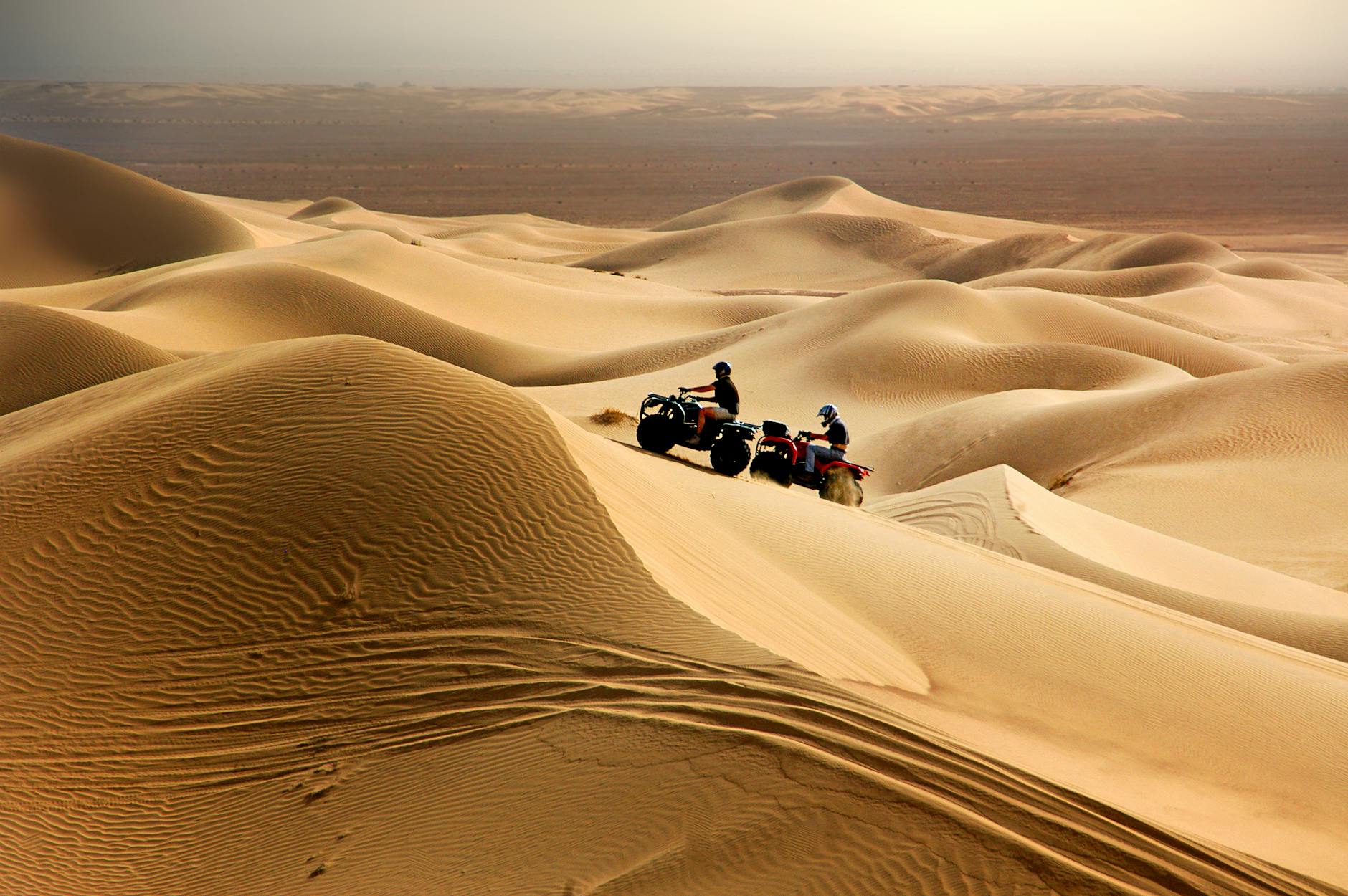 Quad bikes on desert dunes in Morocco