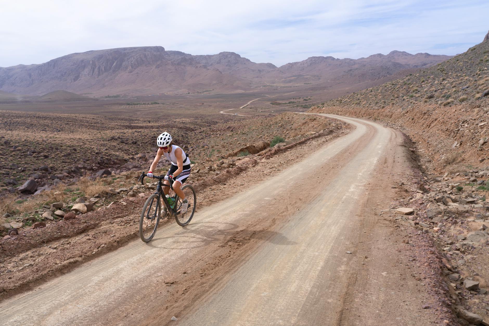 Cyclist on a rugged desert trail