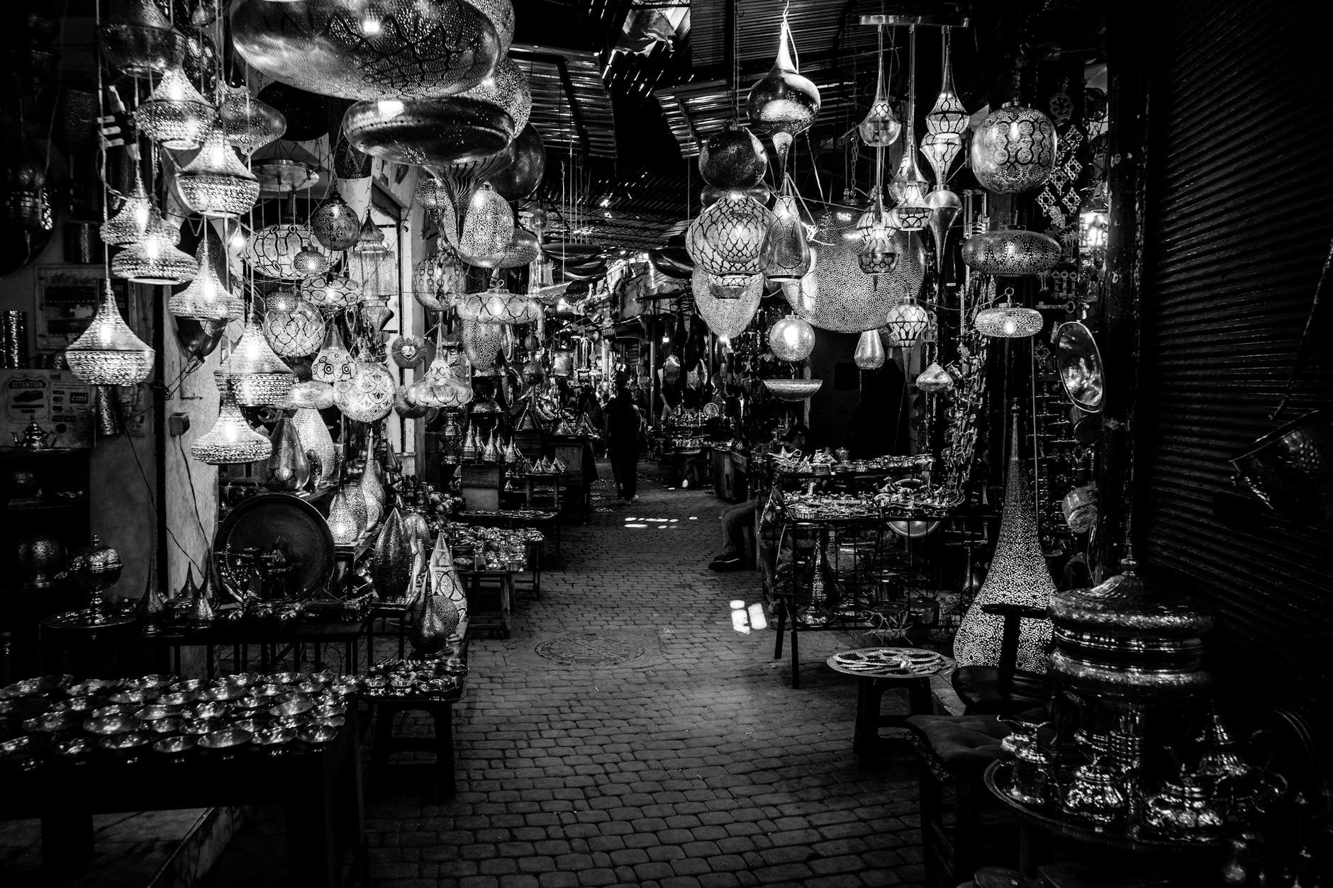Black and white lantern scene in a Marrakesh souk