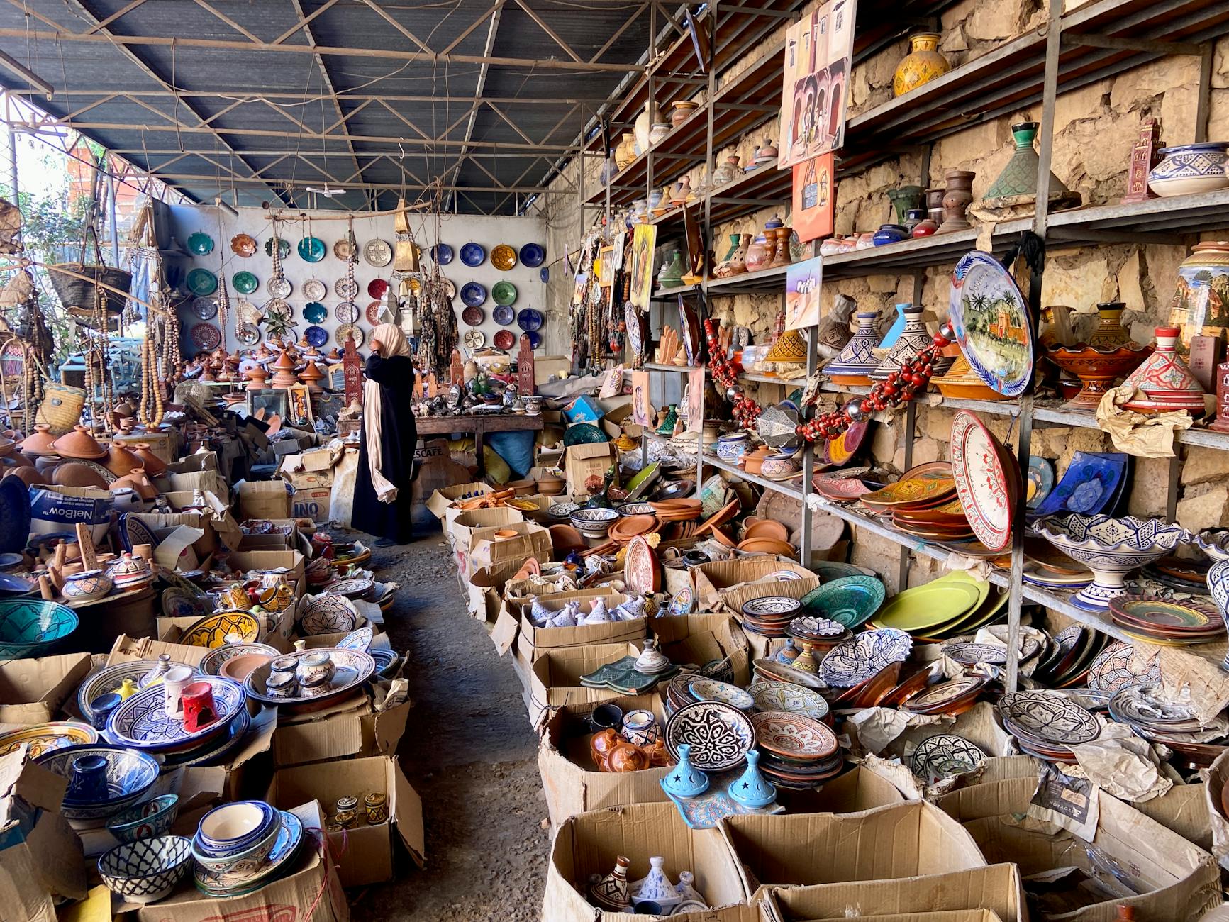 Colorful Moroccan pottery displayed in a market stall