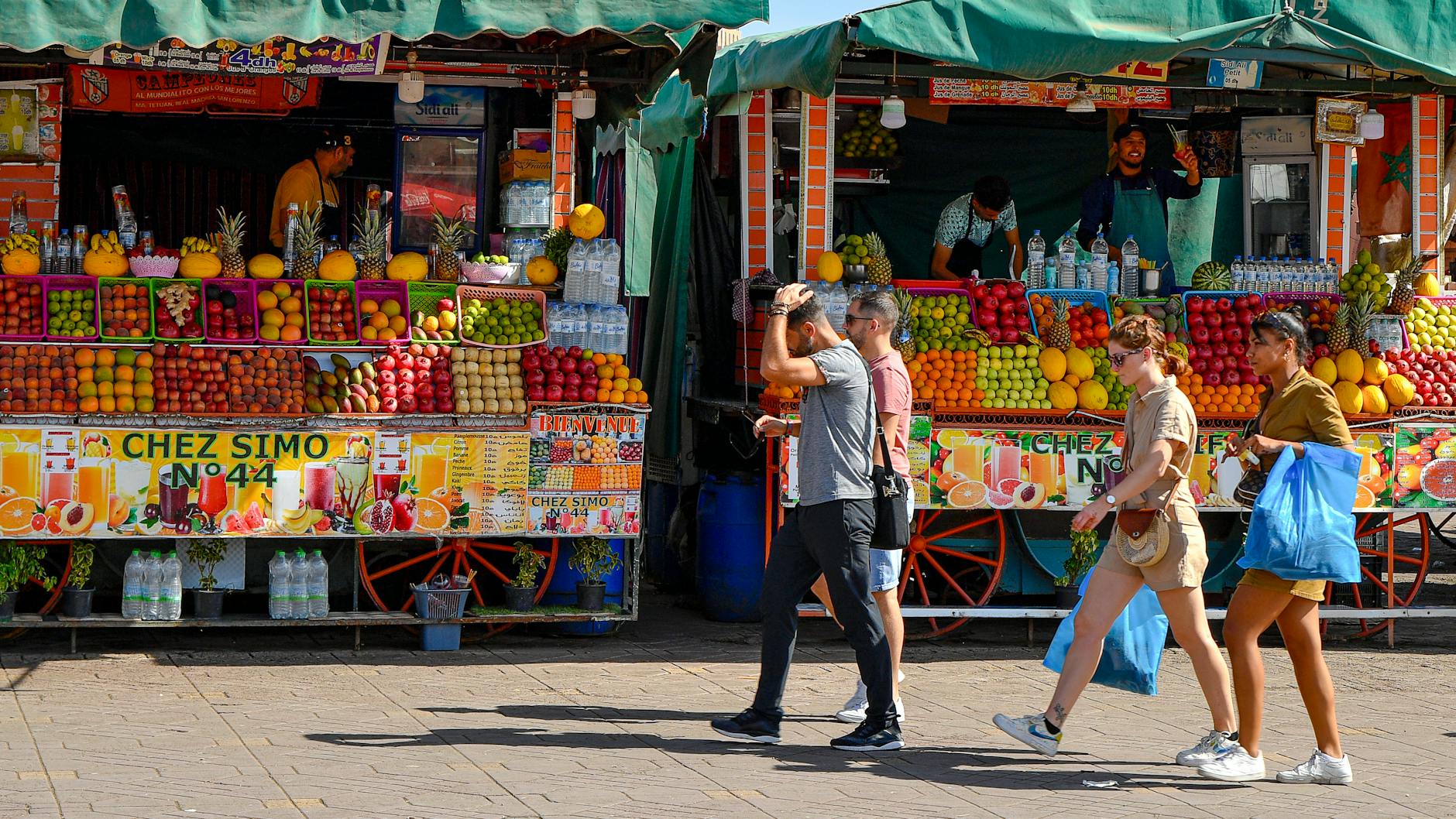 Fresh produce stalls at a Marrakesh street market