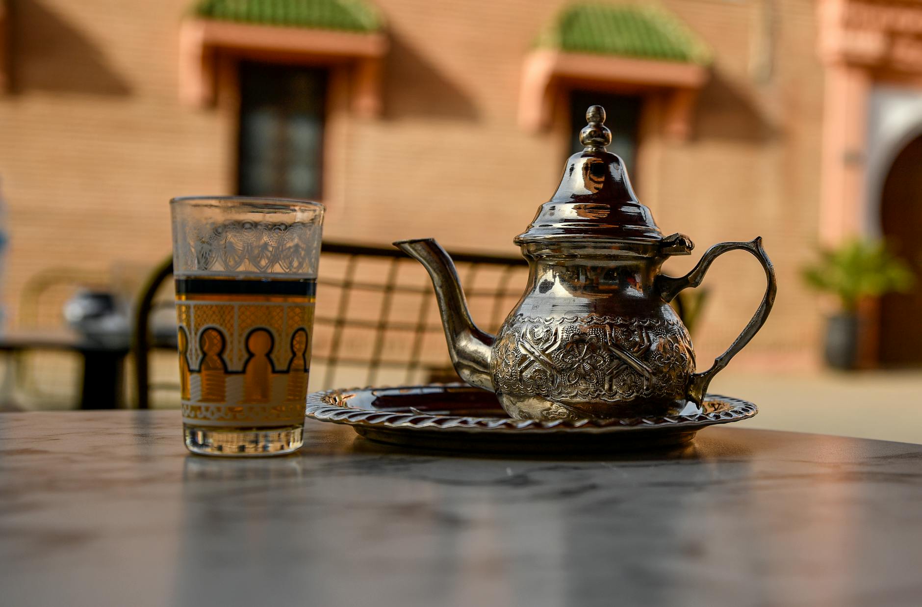 Traditional Moroccan tea set on a table in Marrakech
