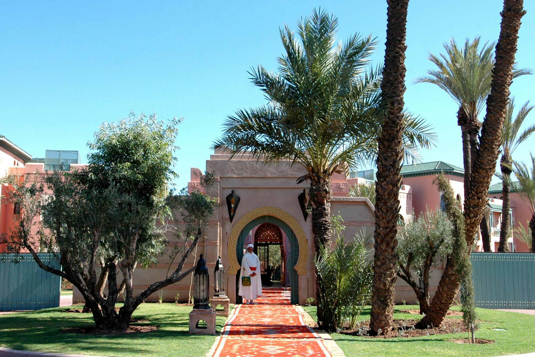 Traditional Moroccan architecture surrounded by gardens in Marrakech