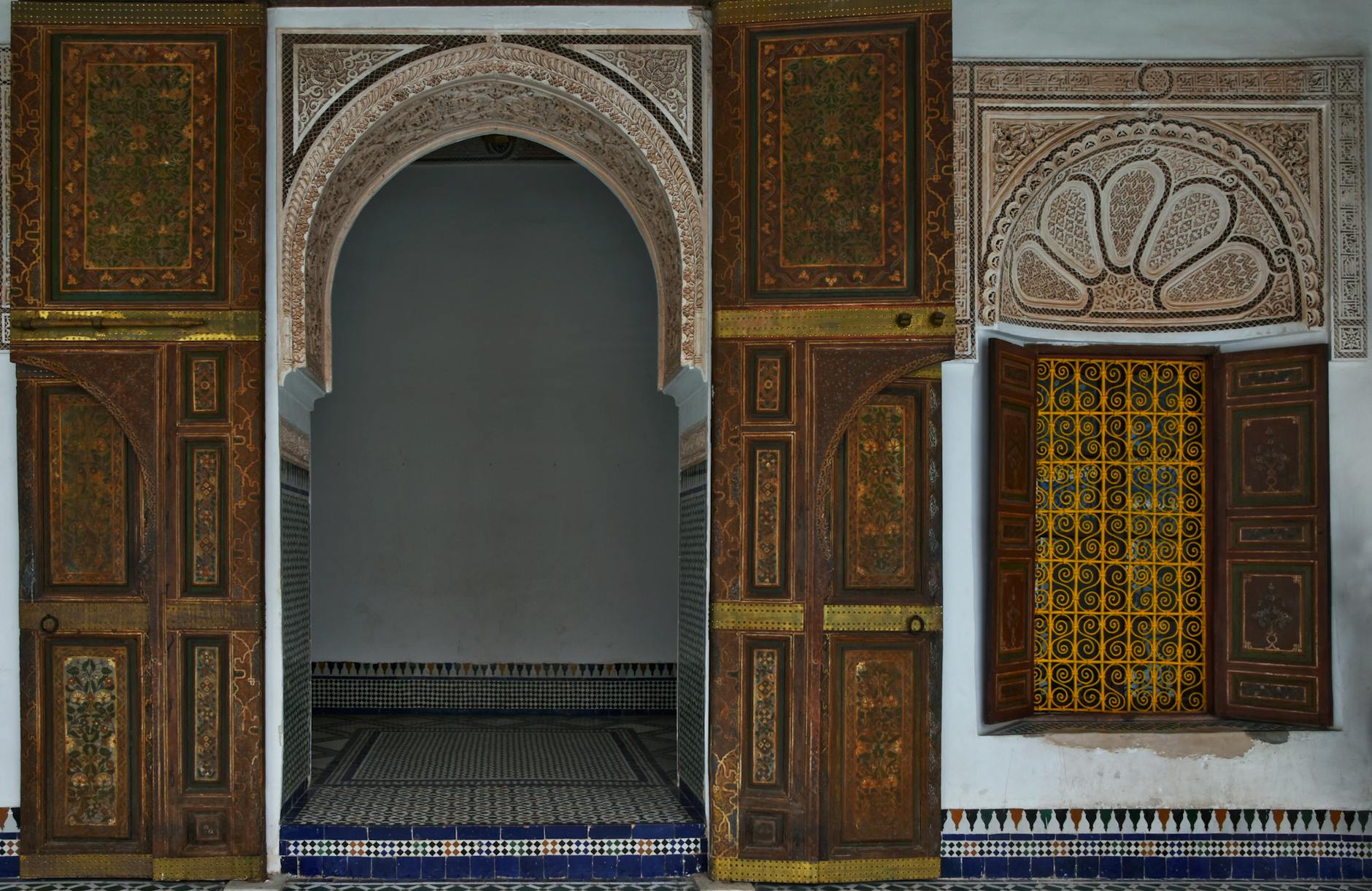 Ornate arches and doors at Bahia Palace in Marrakech