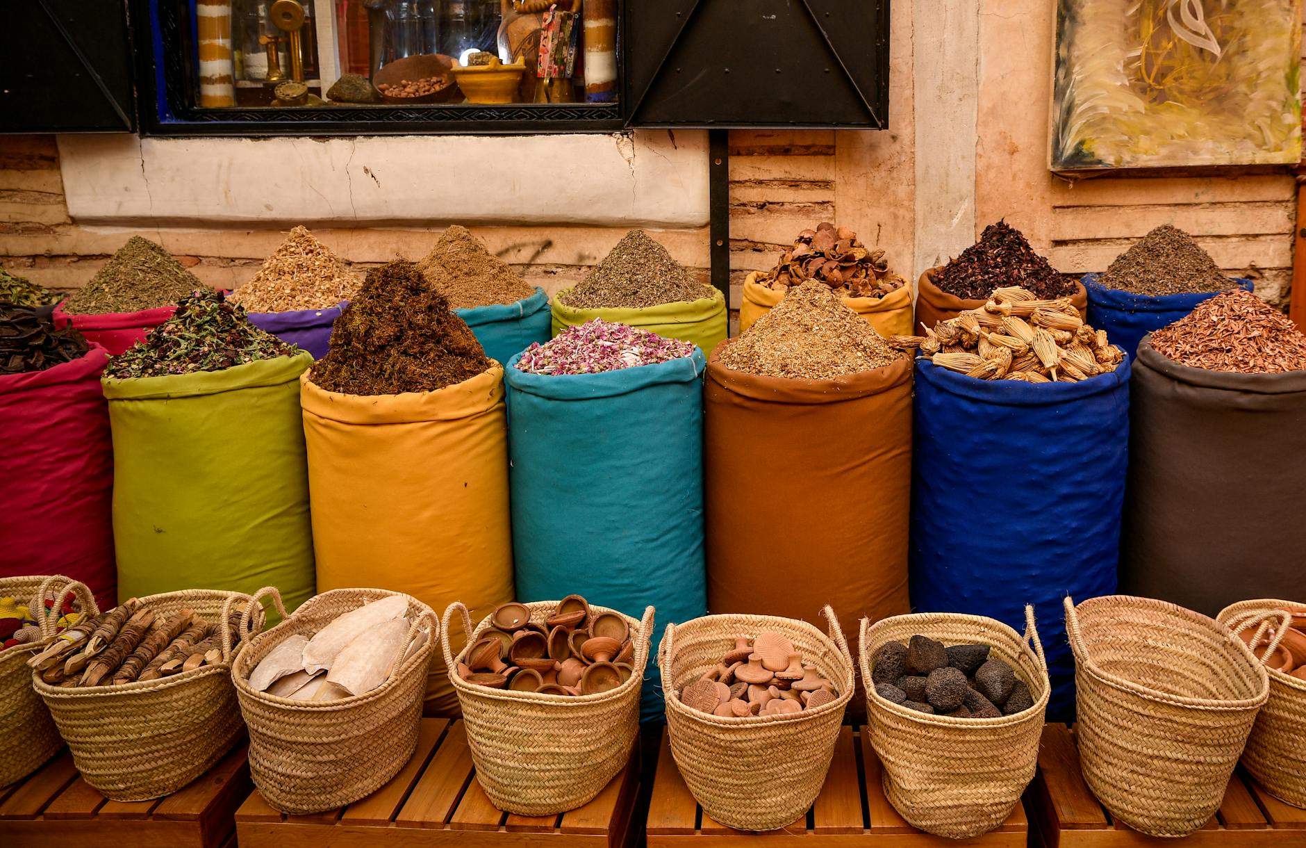 Colorful spice sacks in a Marrakesh souk