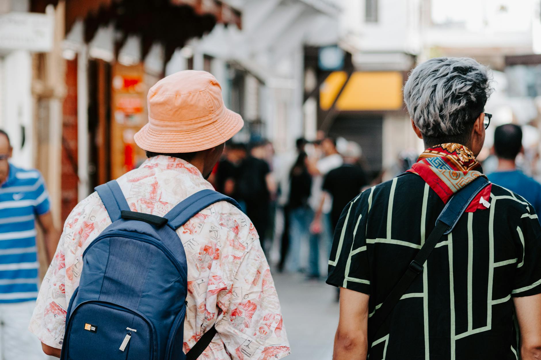 Travelers walking through a busy street in Rabat, Morocco