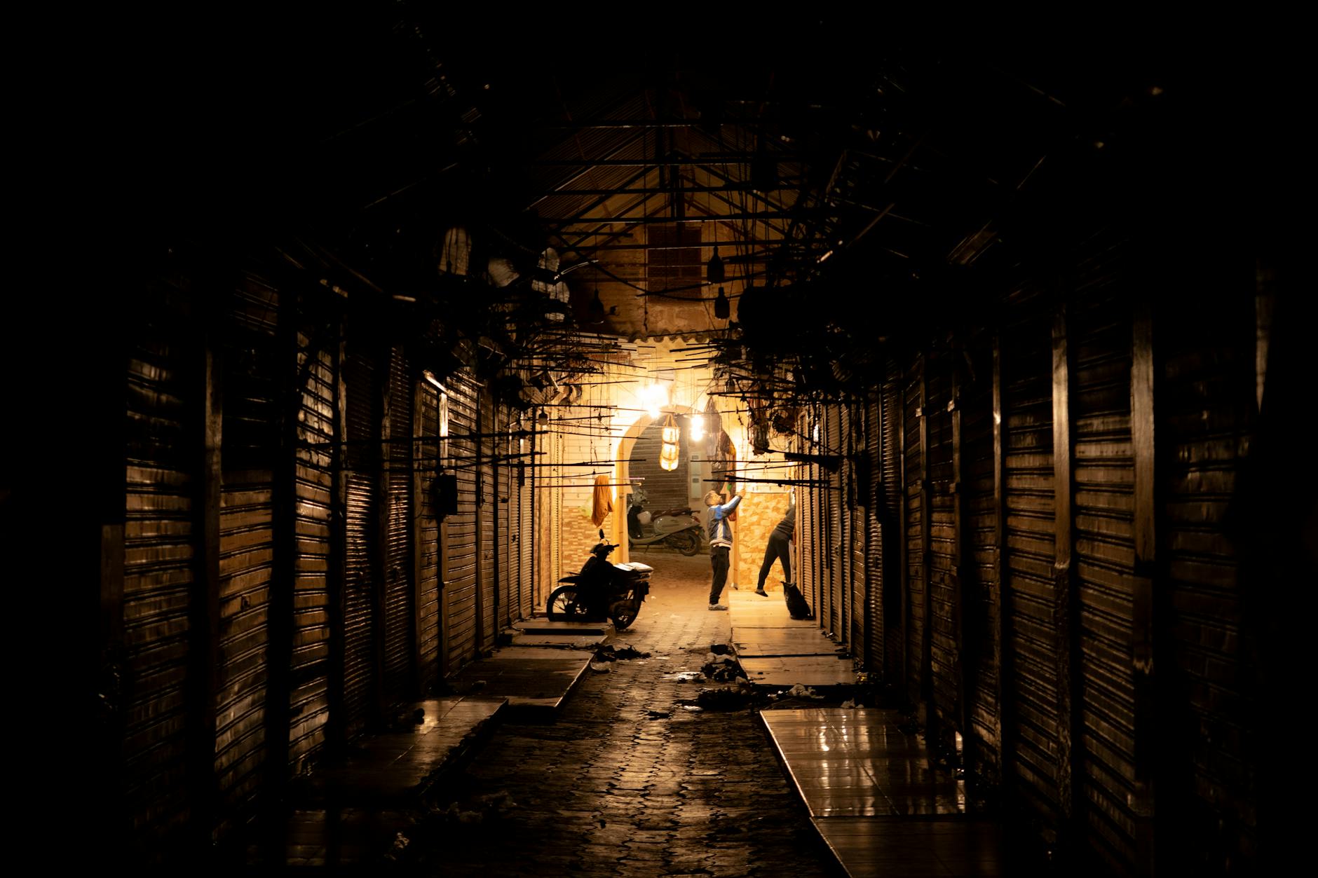 Night scene in a Marrakech medina alleyway