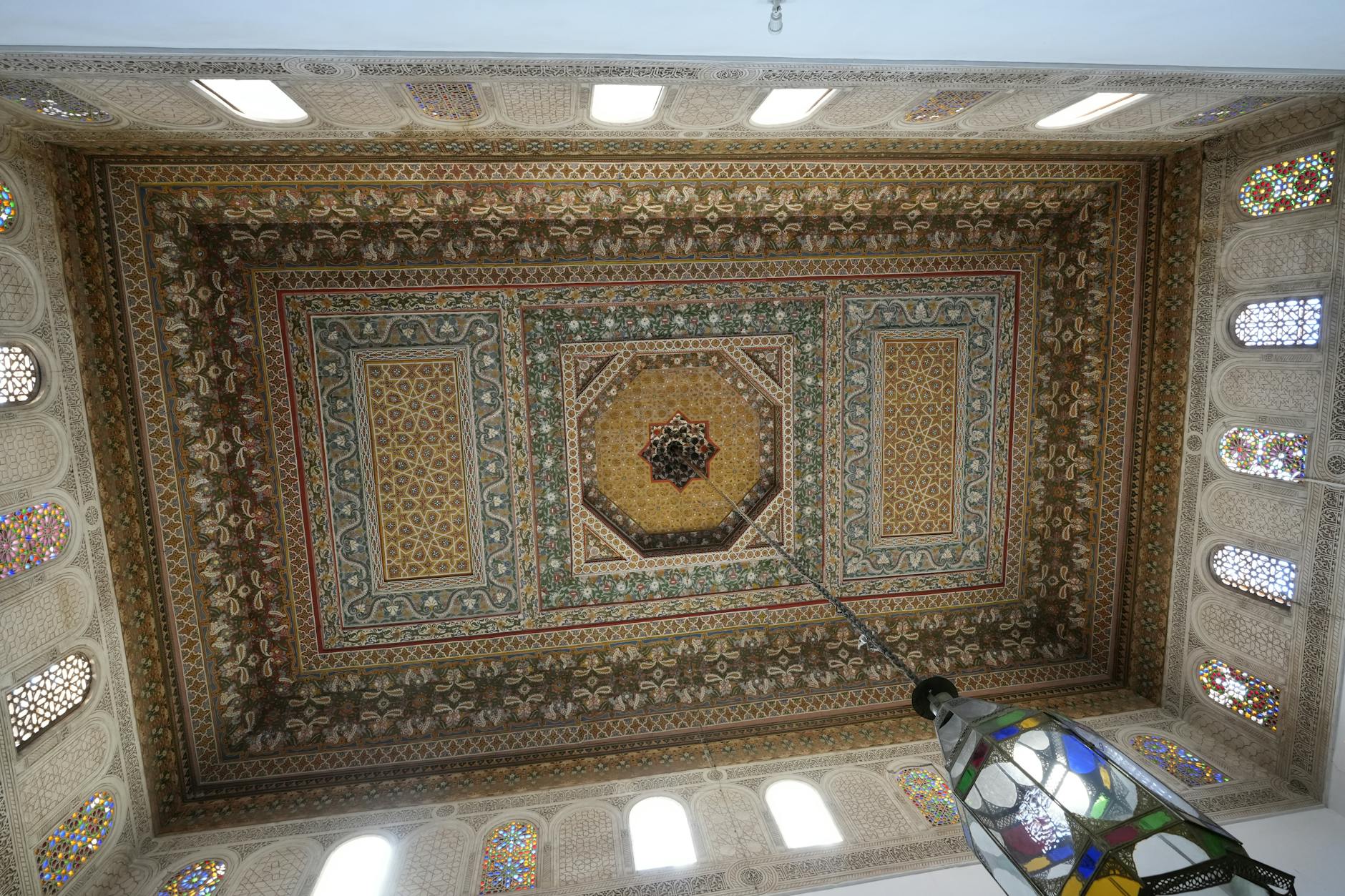 Intricate ceiling design inside a Marrakesh palace