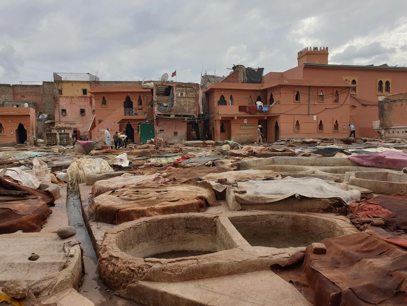 Outdoor tannery in Marrakech with leather production vats