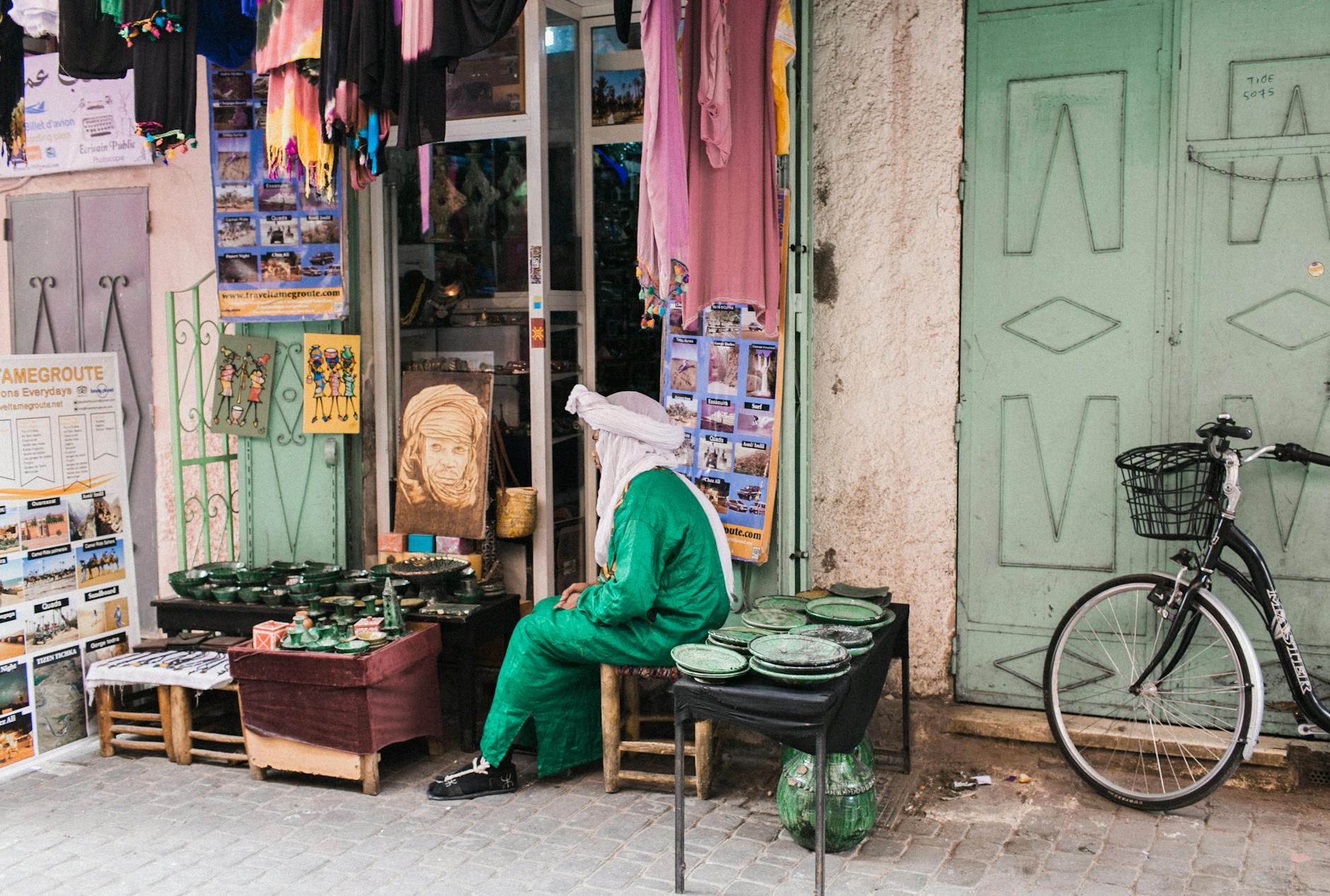 Local street market scene with goods at a shop entrance
