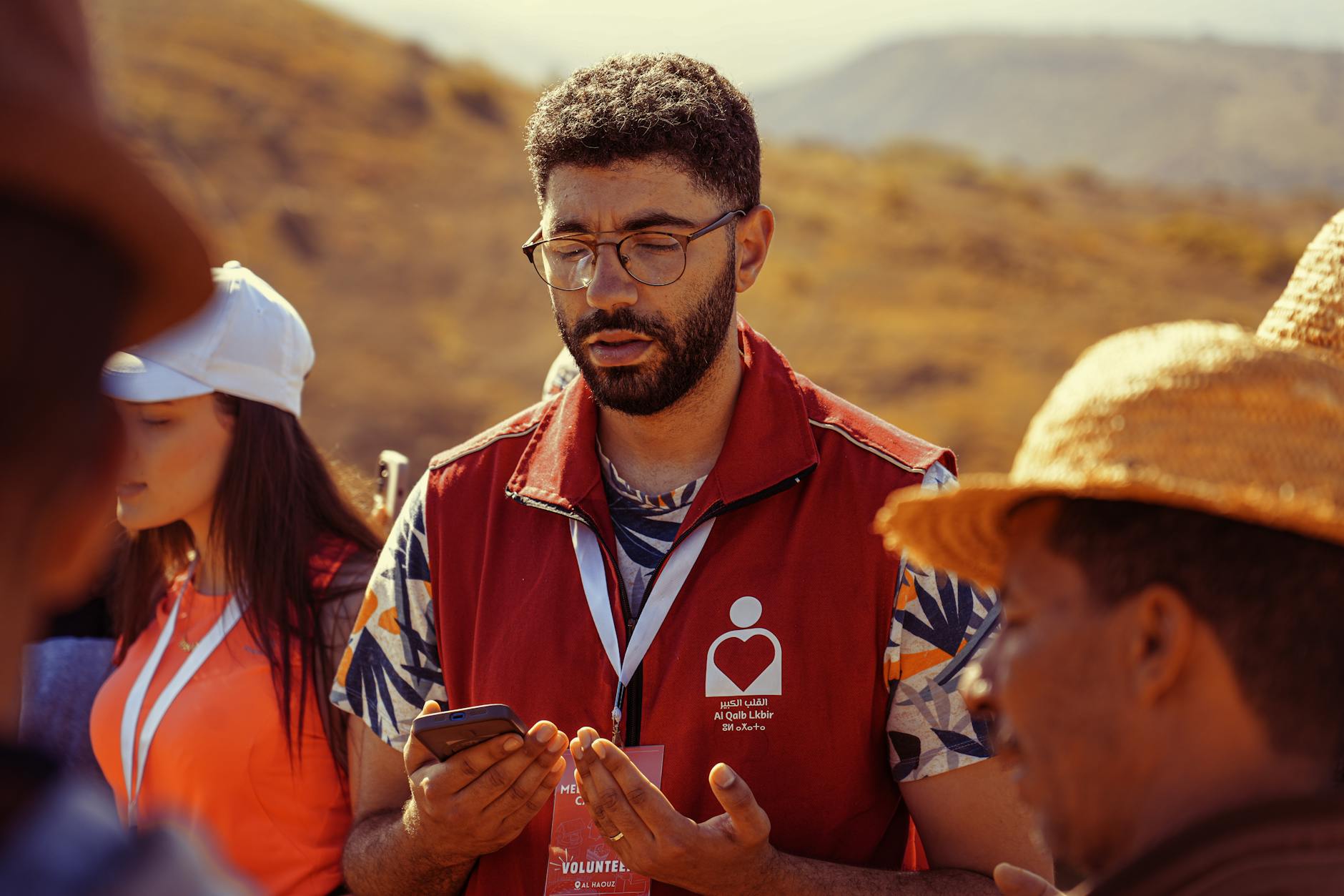 Outdoor volunteer team meeting in a rural setting
