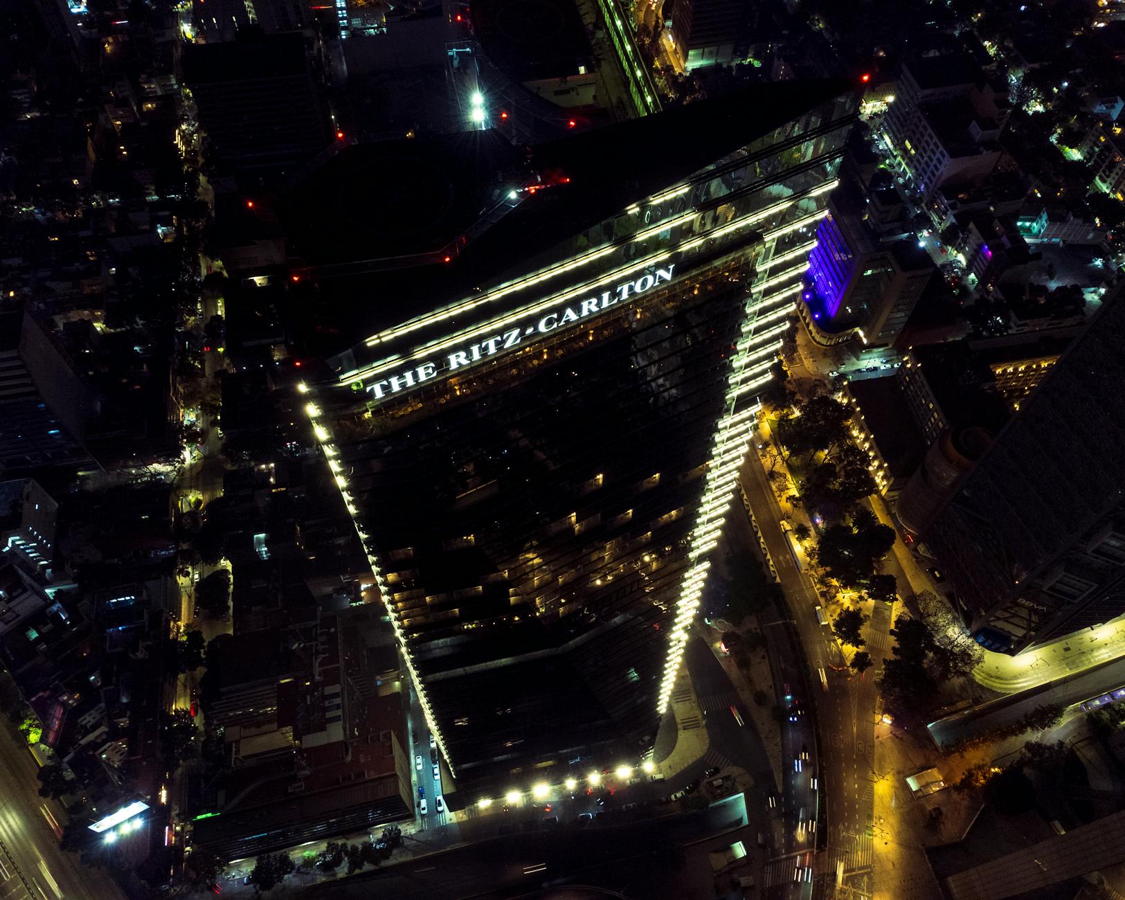 Illuminated high-rise hotel in Mexico City at night