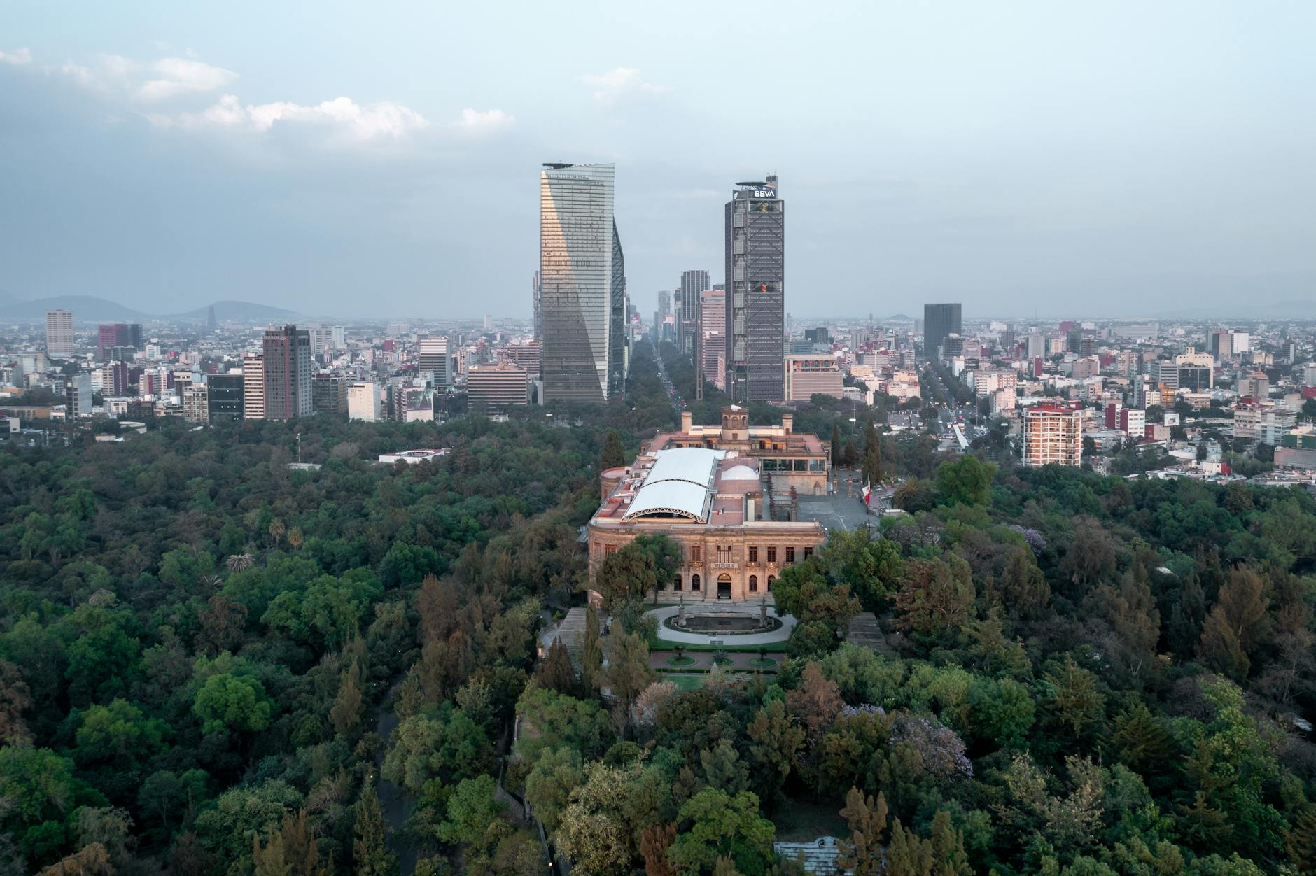 Chapultepec Castle and Mexico City skyline surrounded by greenery