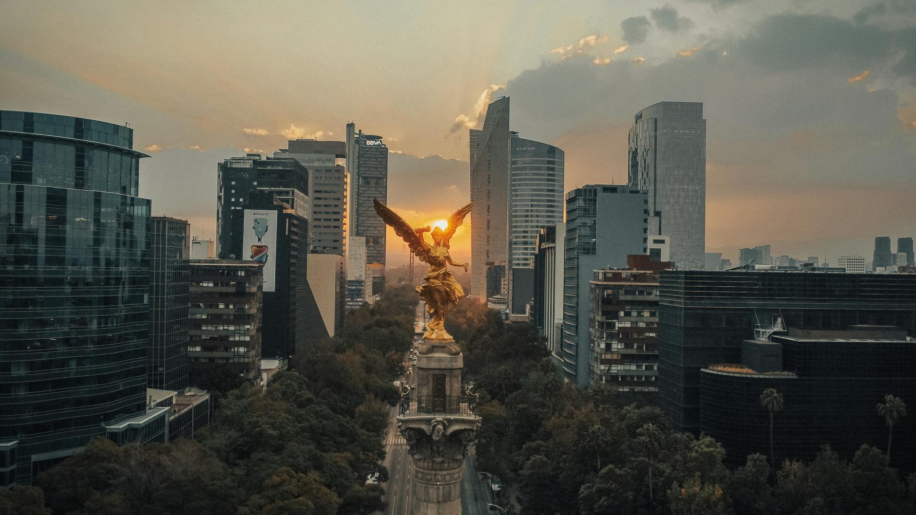 Angel of Independence and Mexico City skyline at sunset