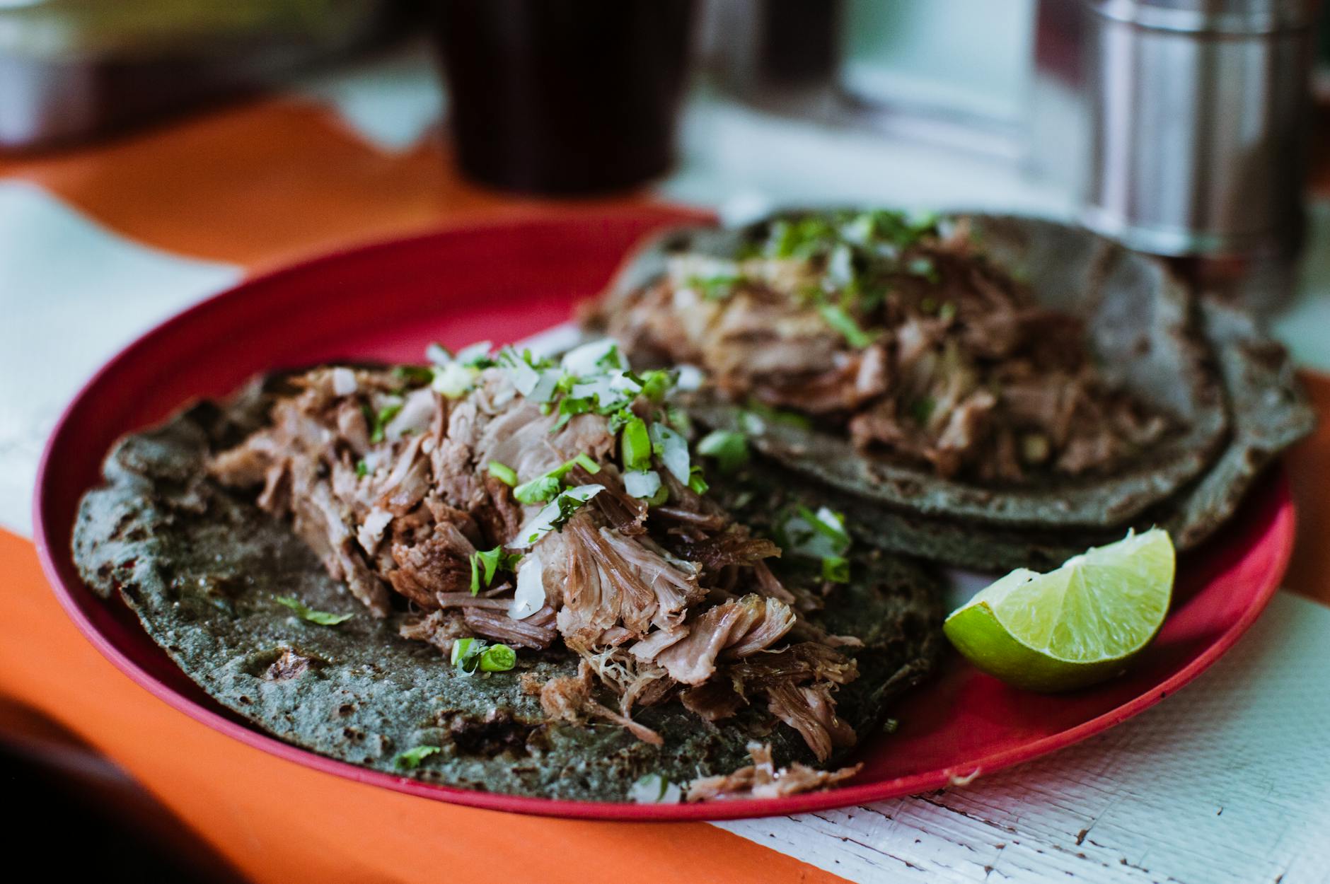 Barbacoa tacos with lime in Mexico City