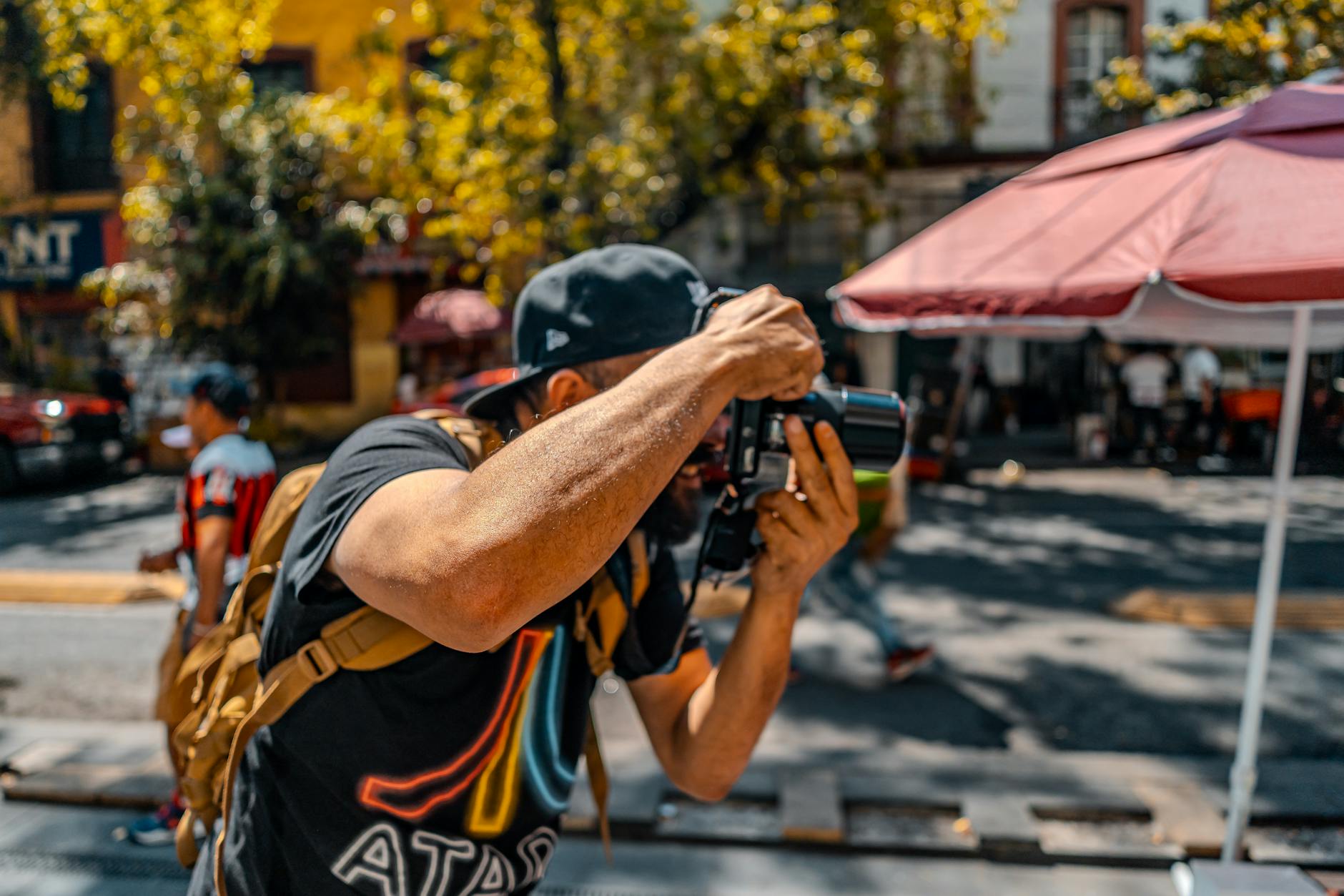 Photographer capturing street life in Mexico City