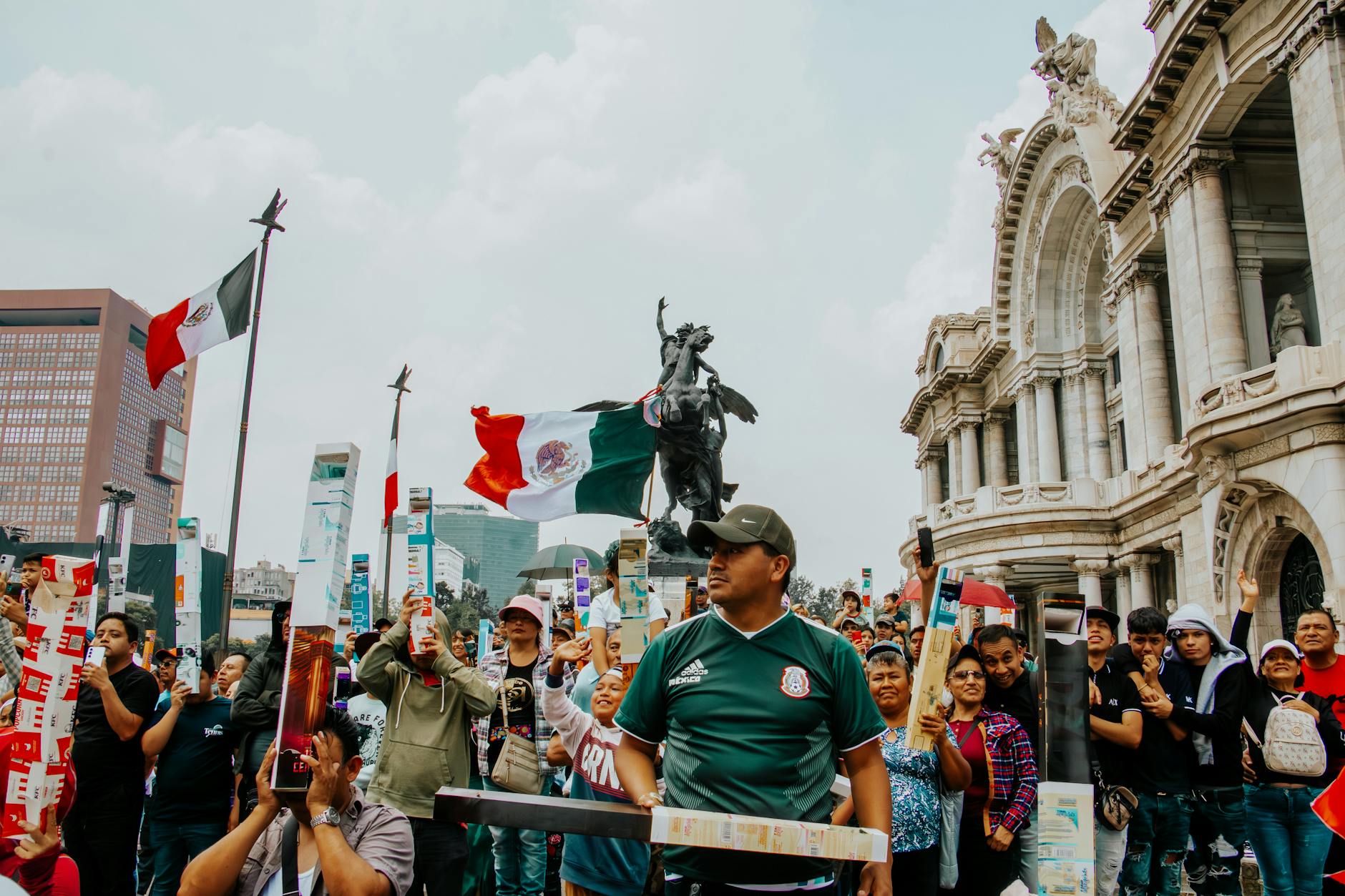 Crowd in front of Palacio de Bellas Artes in Mexico City