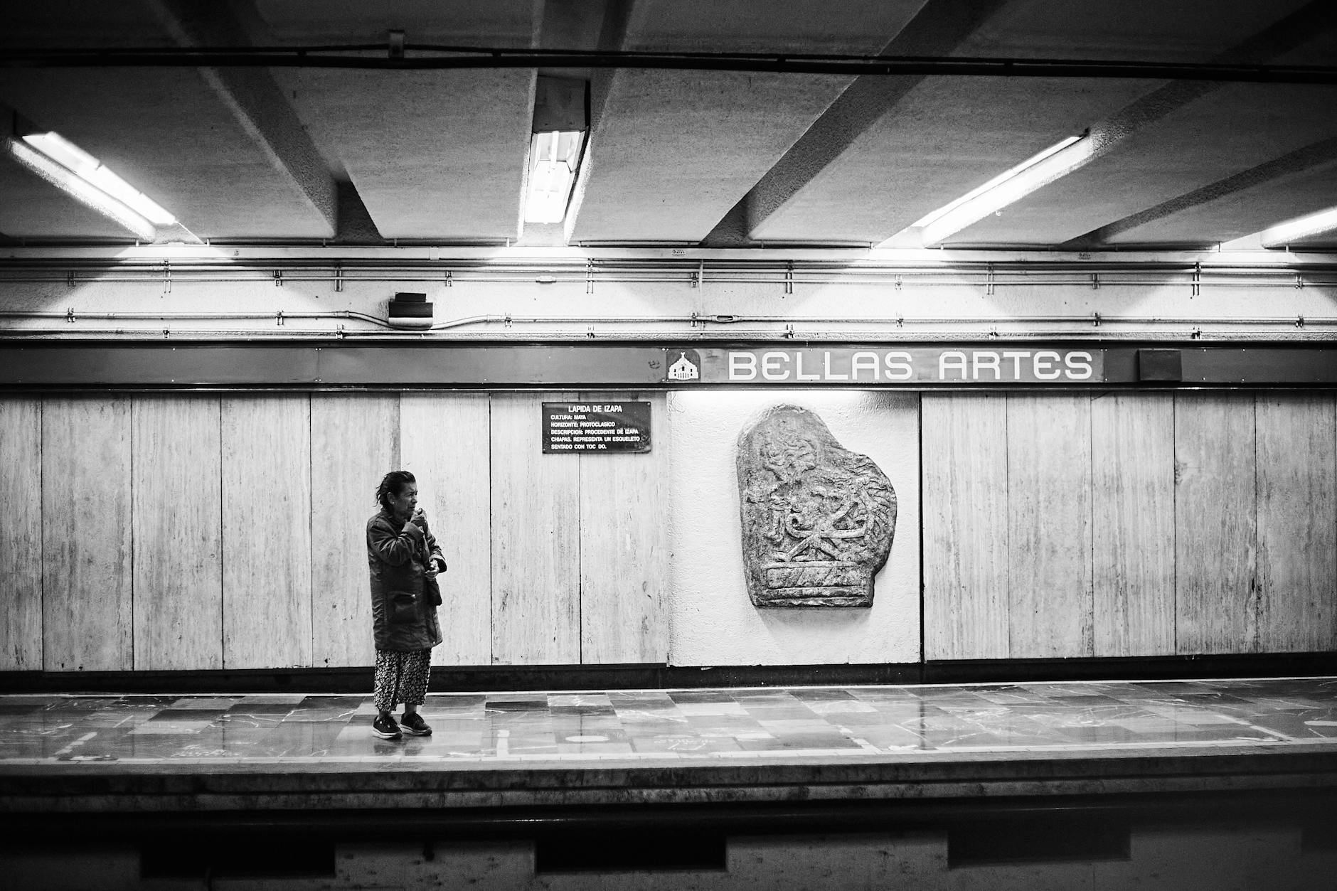 Person waiting at Bellas Artes Metro station